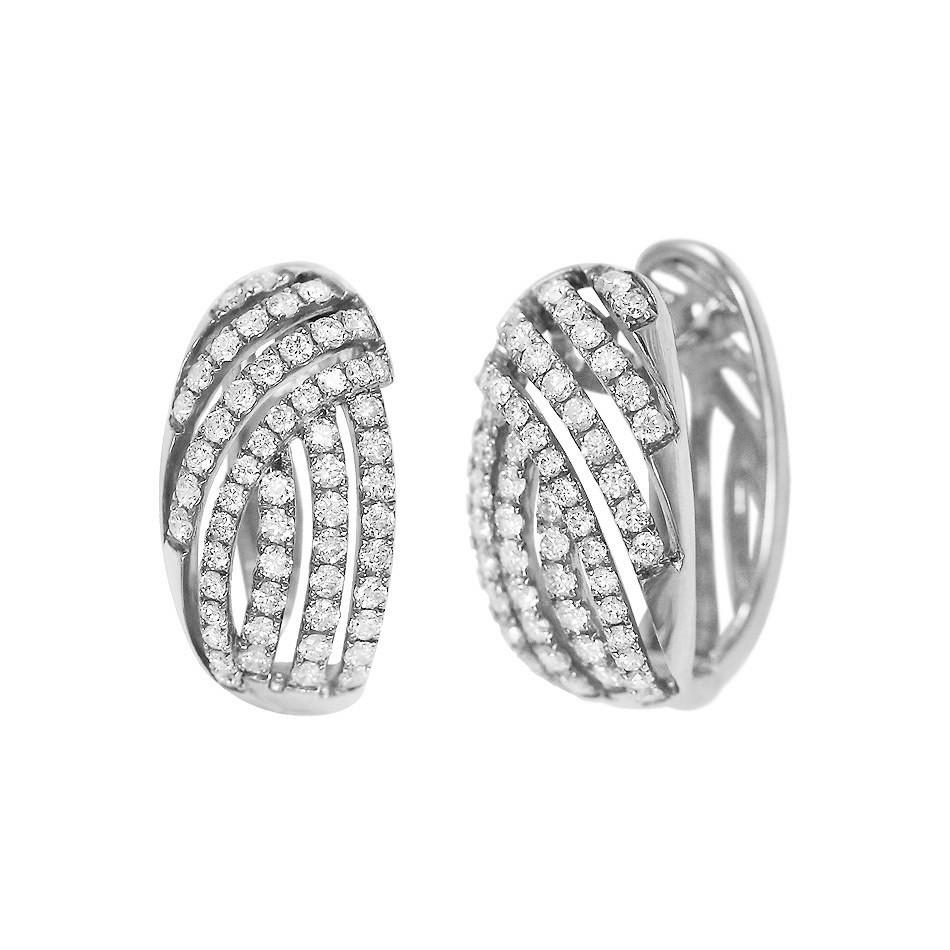 Ring White Gold 14 K (Matching Earrings Available)

Diamond 90-RND-1-G/VS2A 

Weight 4.88 grams
Size 17.5

With a heritage of ancient fine Swiss jewelry traditions, NATKINA is a Geneva based jewellery brand, which creates modern jewellery