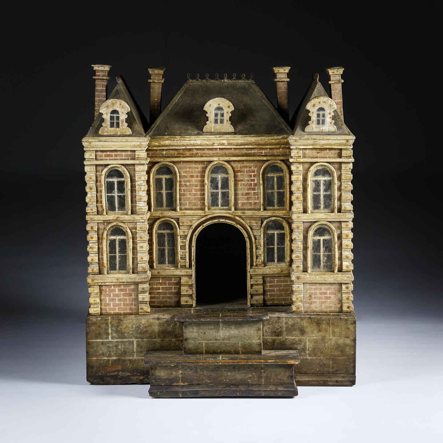 Extraordinary Early 19th Century Chateau Model found untouched in its original painted finish. impressive attention to detail with some carved brickwork, ironwork ridge decoration and Oeil - de - boeuf windows. France, circa 1820.