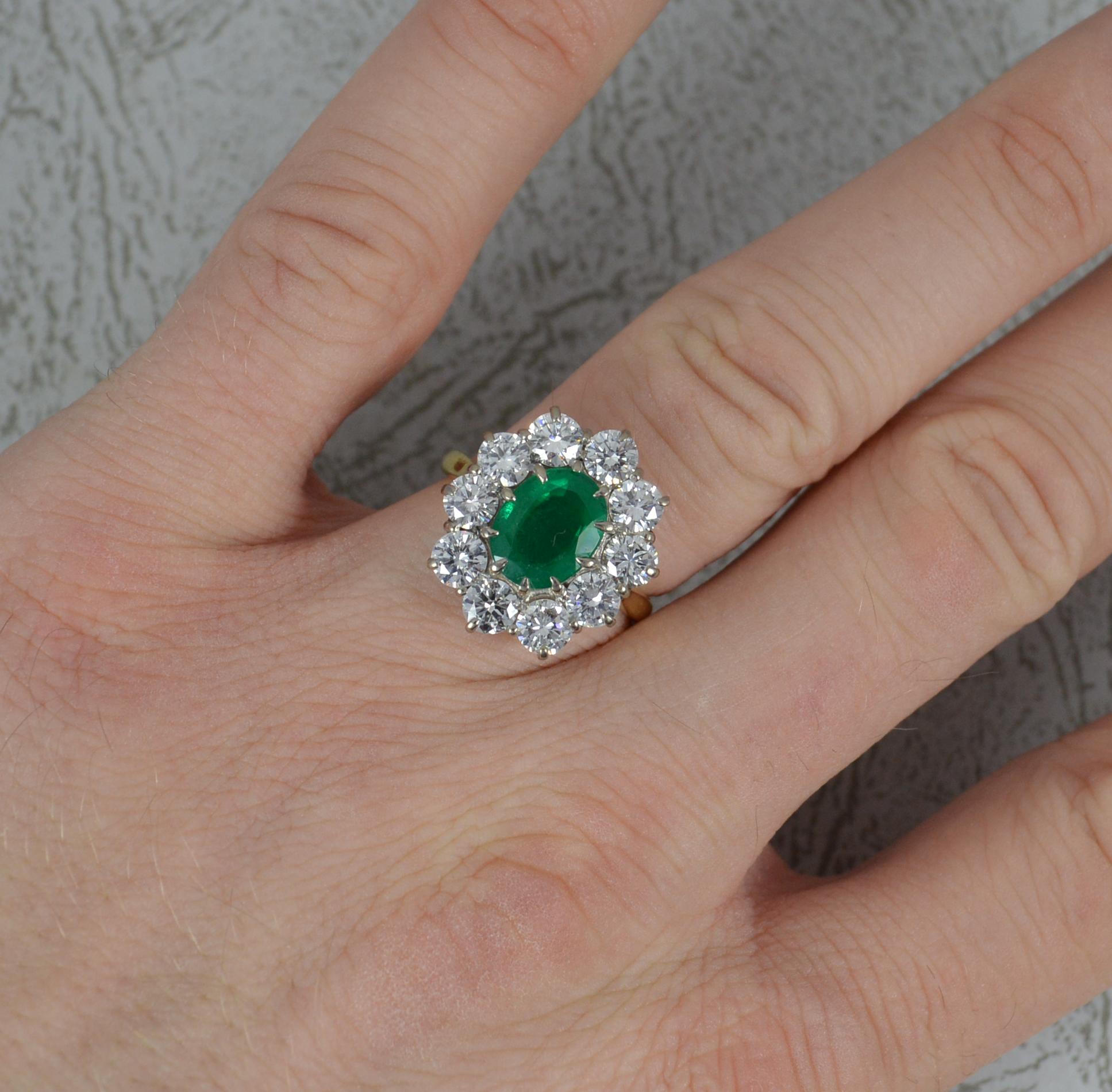 A beautiful Emerald and Diamond ring.
Solid 18 carat yellow gold shank with white gold head setting.
Designed with an oval cut emerald to the centre, 6.8mm x 8.9mm approx. Set into a multi claw setting. Surrounding are ten round brilliant cut