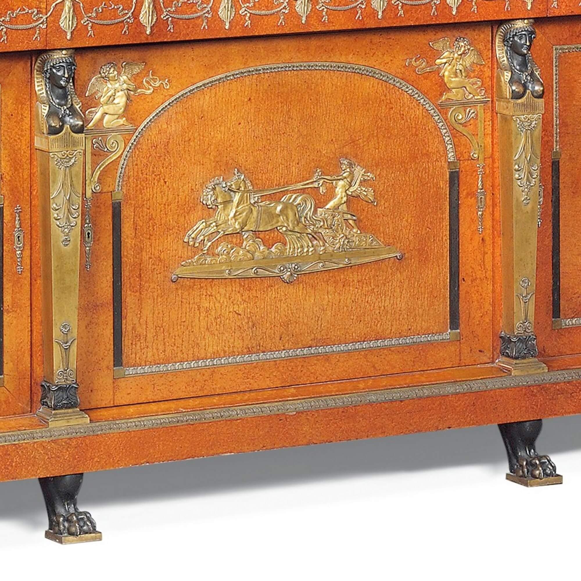 Impressive Empire style buffet by Maison Krieger
French, circa 1900
Measures: Height 199cm, width 217cm, depth 66cm

This magnificent Empire style cabinet is a superb work of French craftsmanship by the esteemed Maison Krieger. The lower section