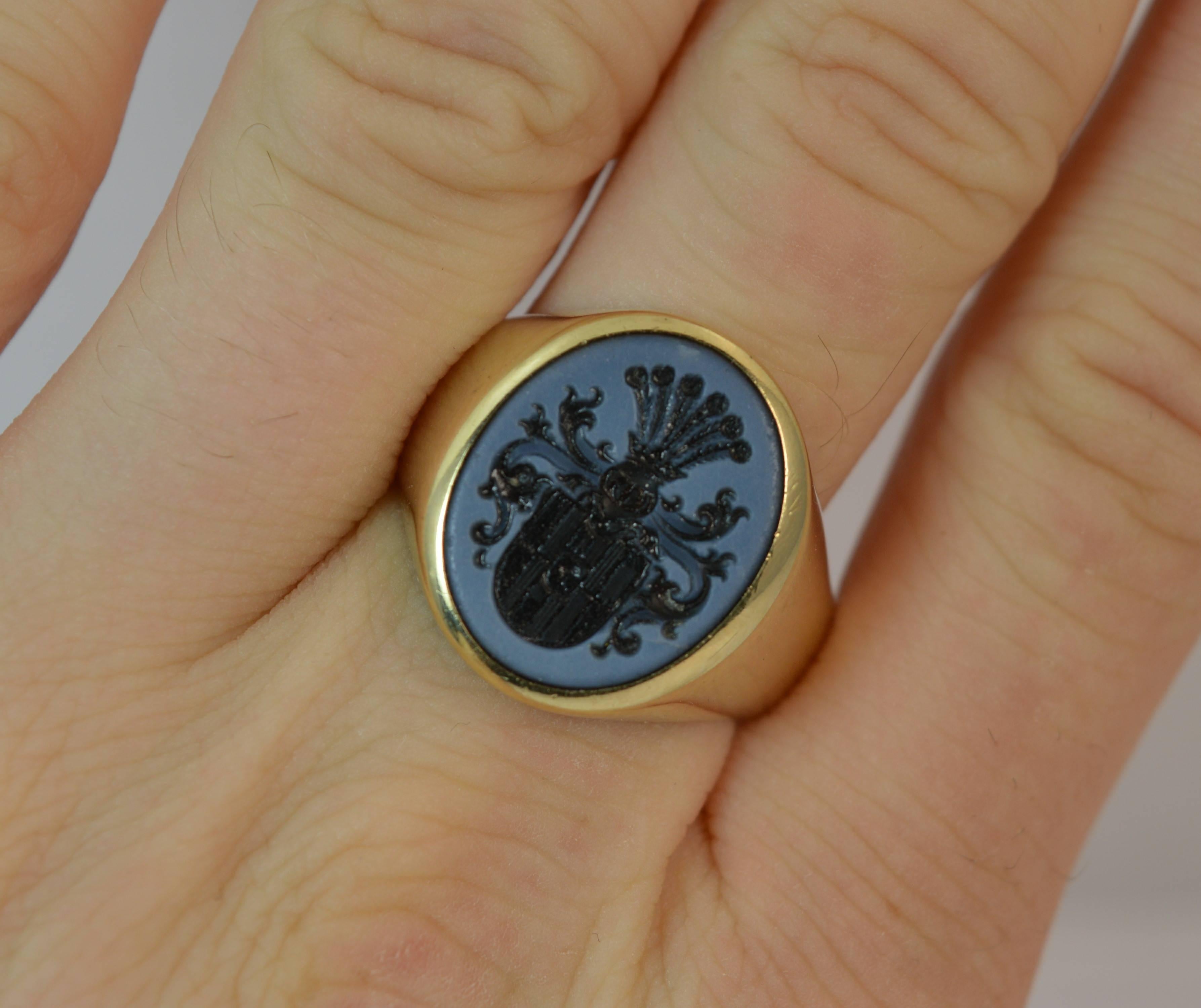 
A beautiful and excellent quality signet ring.

​14 carat yellow gold shank and setting.

​Designed with a large oval agate to centre, 14mm x 17mm approx with a very finely engraved intaglio.

​The intaglio or seal is of a family crest of excellent