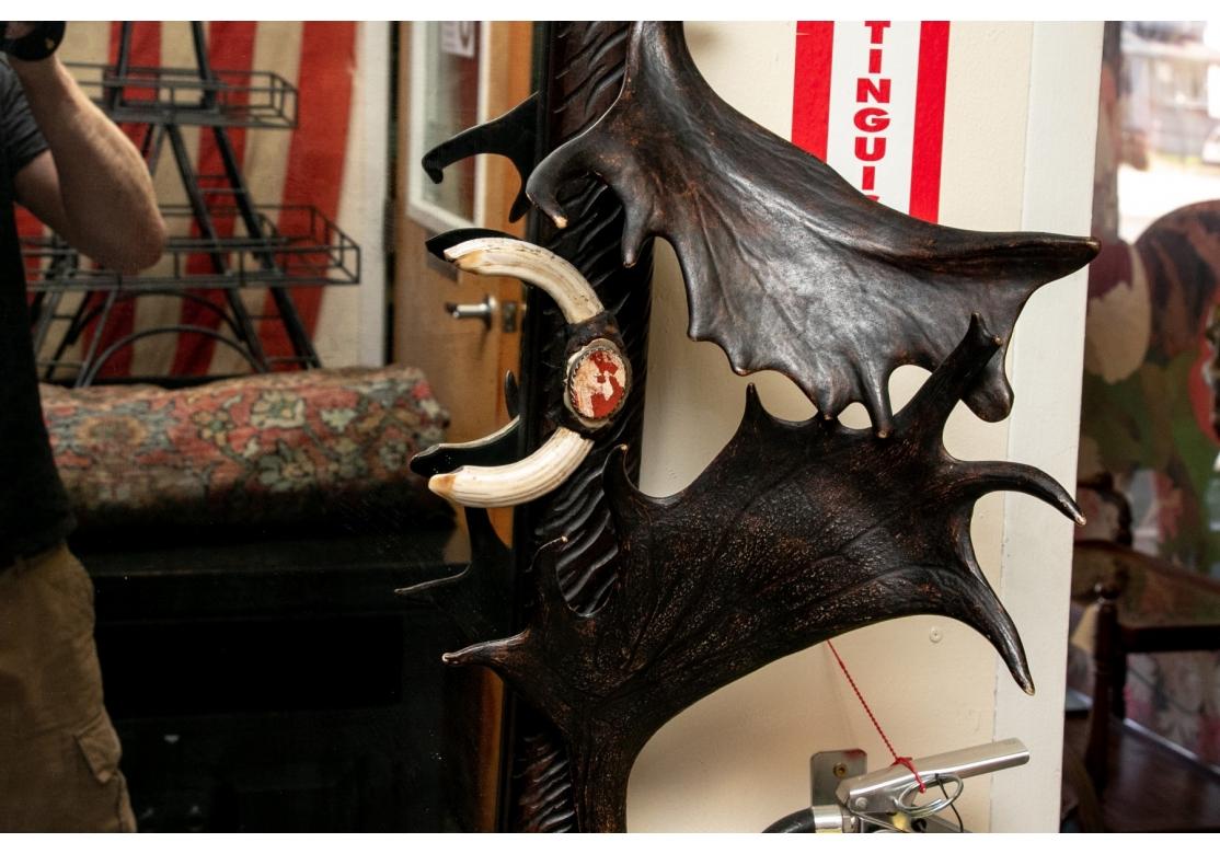 Impressive Figural Stag Head Mirror Garnished with Faux Antlers & Tusks In Good Condition For Sale In Bridgeport, CT