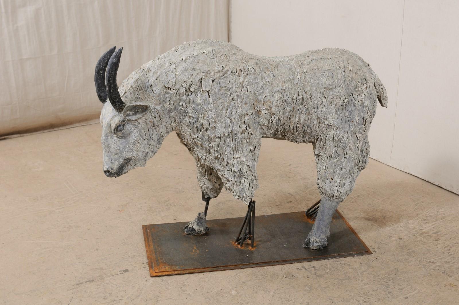 concrete goat statue