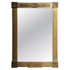 Impressive gilded wall mirror in the Neoclassical/Empire style