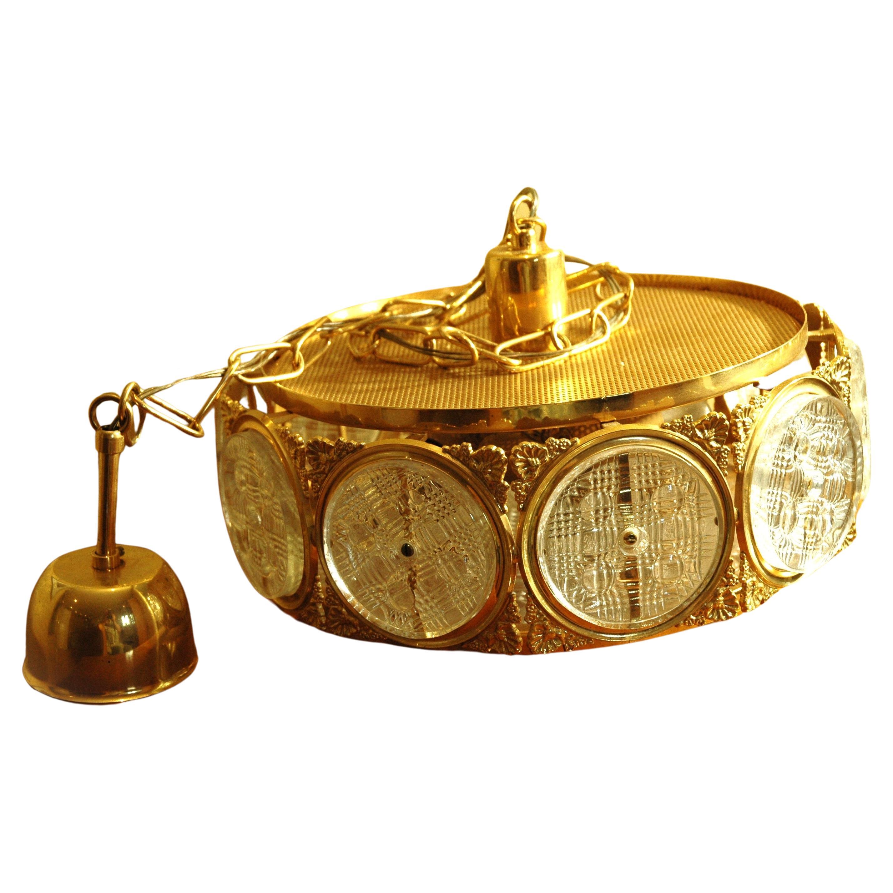 Impressive glass and brass Pendant by Carl Fagerlund for Orrefors For Sale