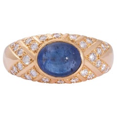 Vintage Impressive men's gold signet ring with cabochon sapphire and diamonds.
