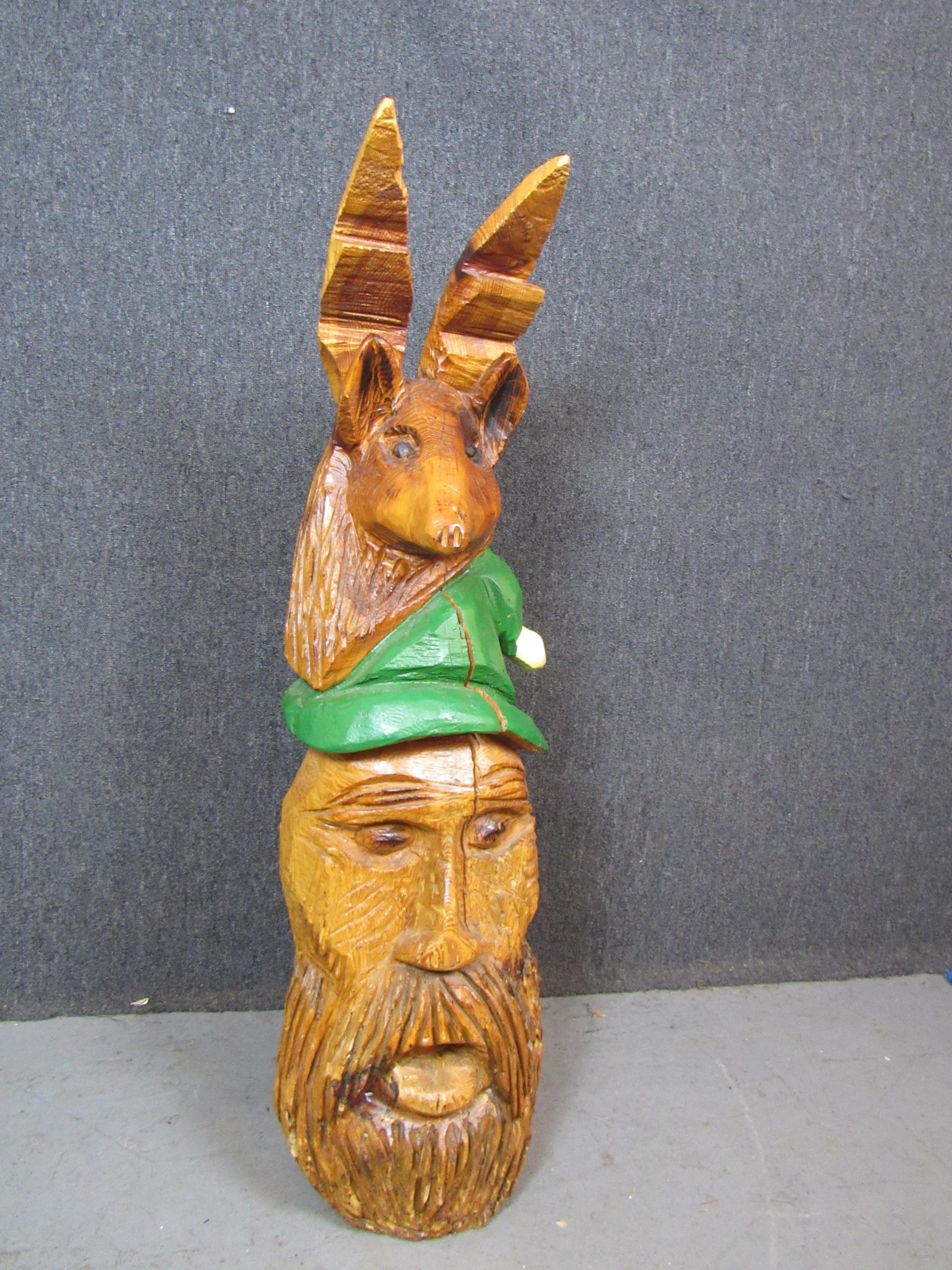 If great art is meant to inspire and provoke, this beautiful carving of a gnome with a deer on it's head may be the greatest piece of art ever made. Hand carved by the artist 