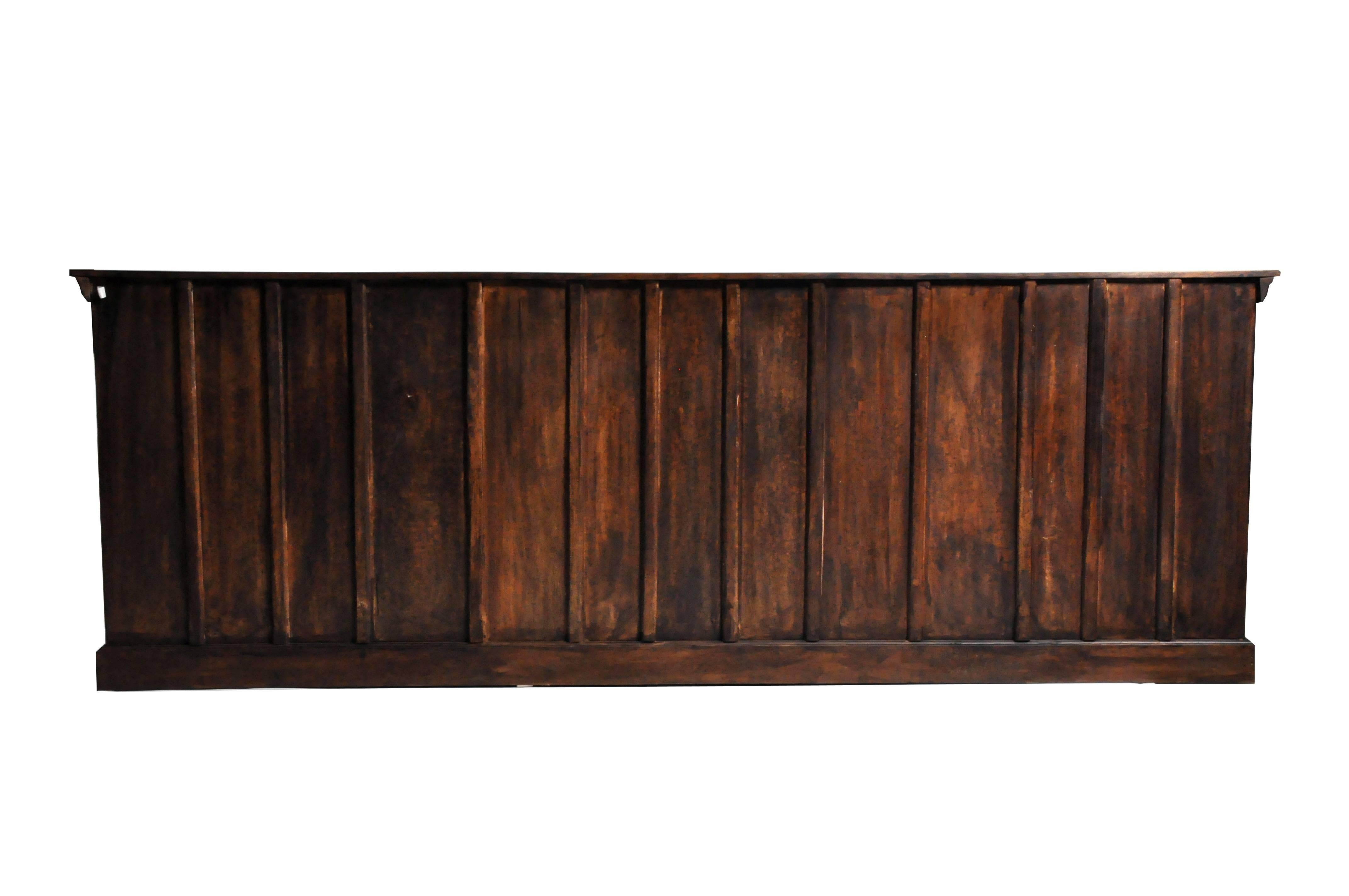 This impressive sideboard is from Jodhpur, India and made from hardwood, circa 1960. The piece features a beautiful patina and three pairs of doors that opens up to shelves for storage. Great accent piece to add to any room in your wonderful home.