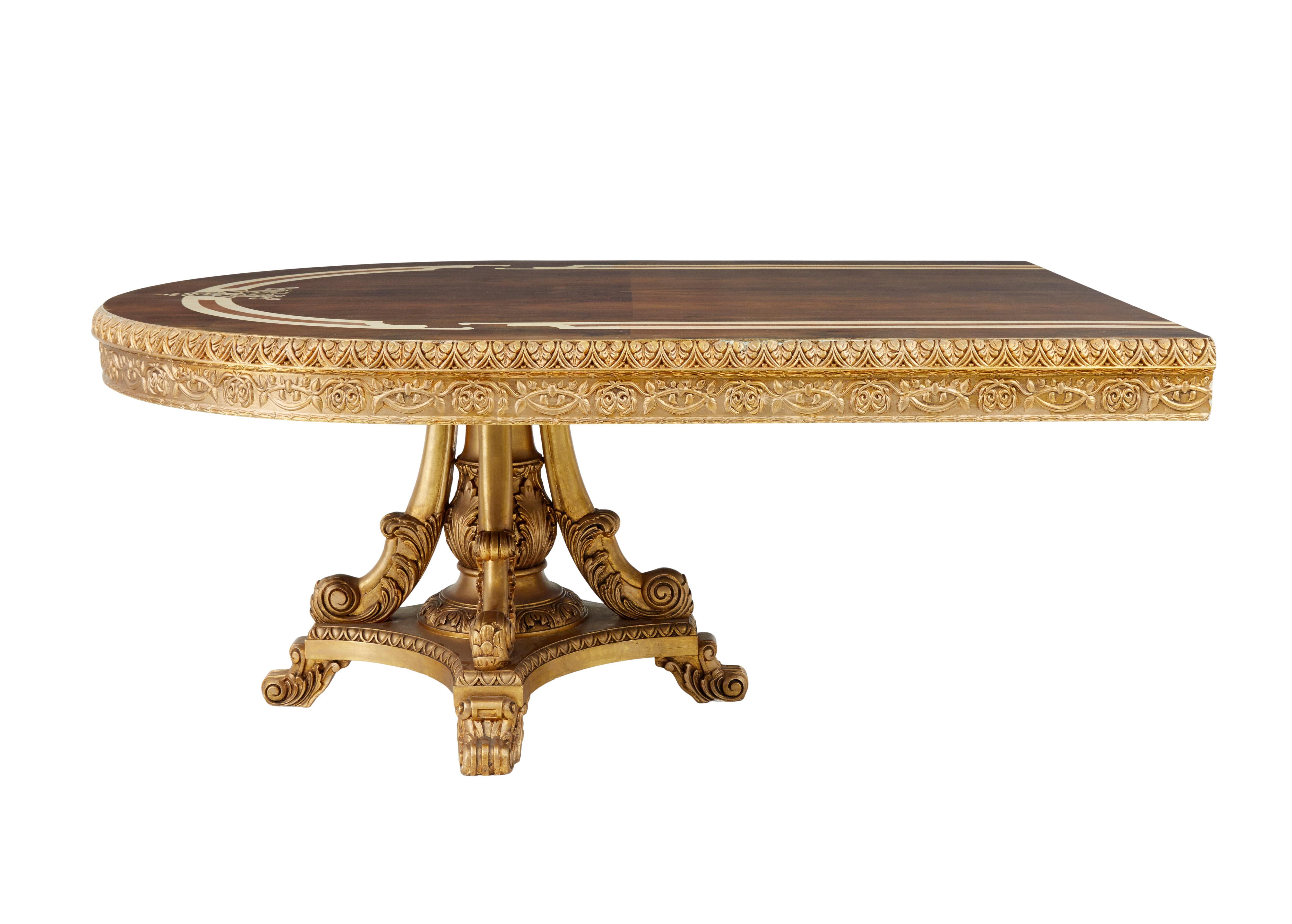 English Impressive inlaid walnut and gilt dining tables of grand proportions For Sale