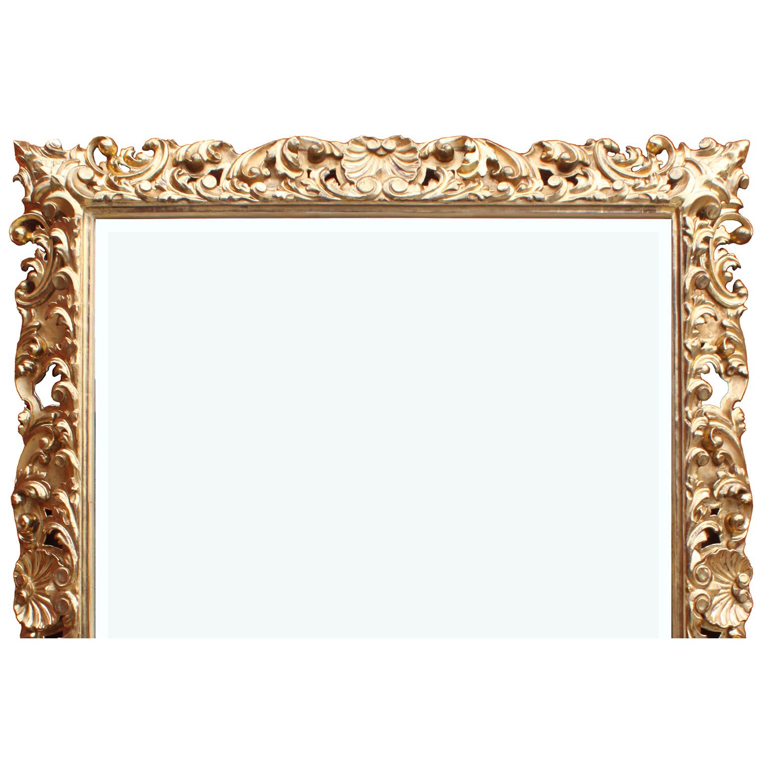 A fine, large and impressive Italian 19th century Baroque Revival style giltwood carved mirror frame. The ornately carved rectangular shaped frame, with floral, scrolled and seashell carved frame, which can be hanged either vertically or