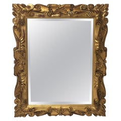 Impressive Italian Carved 22-Carat Gold Leaf Giltwood Mirror