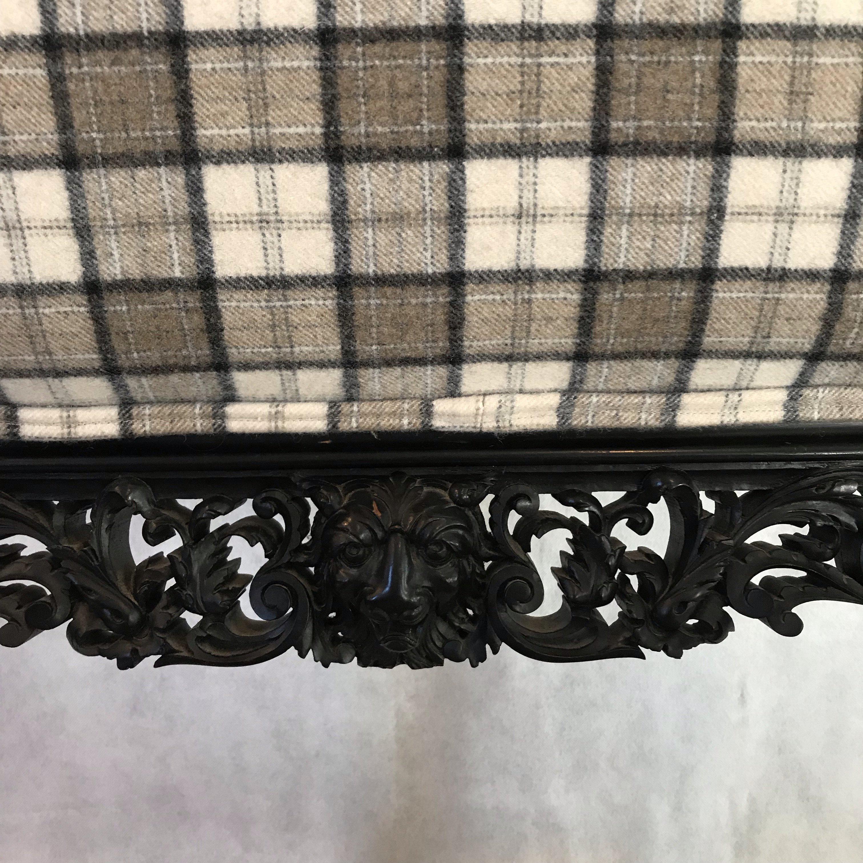 French Impressive Jaunty Pair of Plaid Intricately Carved Ebonized Lions Head Chairs For Sale