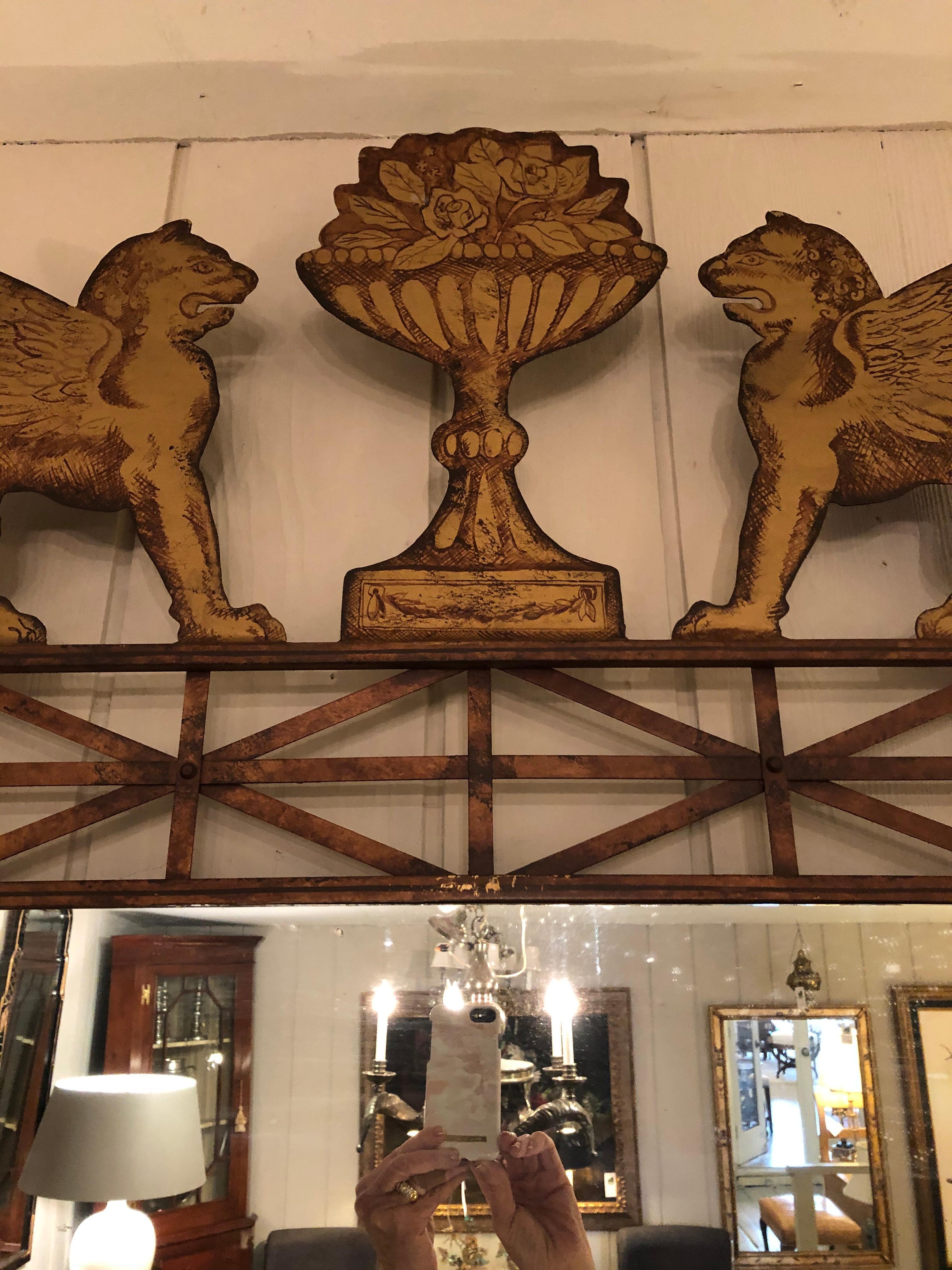 American Impressive Large Pair of Gilt Iron & Tole Mirrors with Winged Griffins