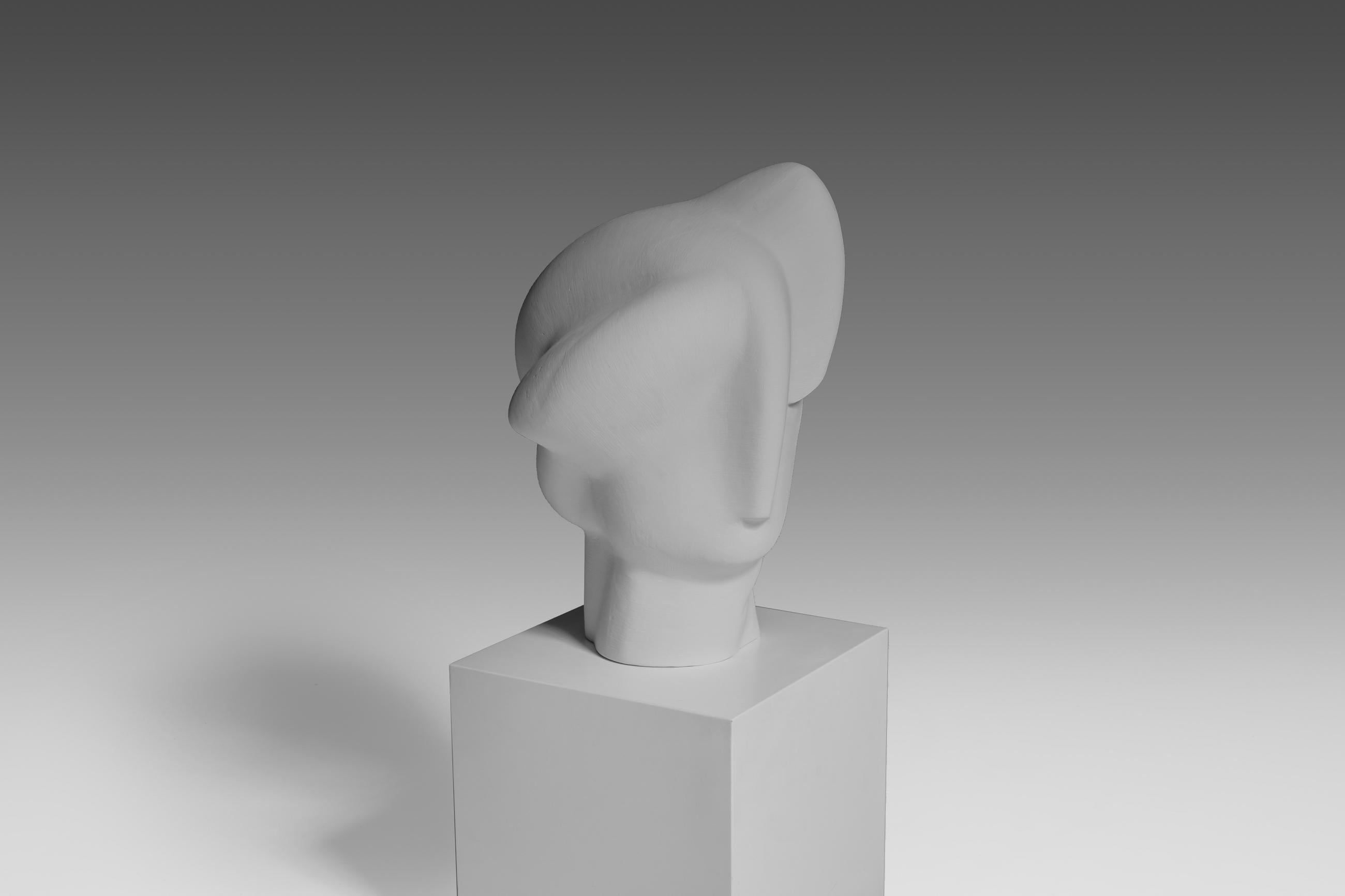 Large abstract sculpture of a female head, France, 1960s. The sculpture shows many interesting lines, shapes and curves that really appeal to the imagination. Very elegant in form and impressive in size. Interesting from every single angle. Signed