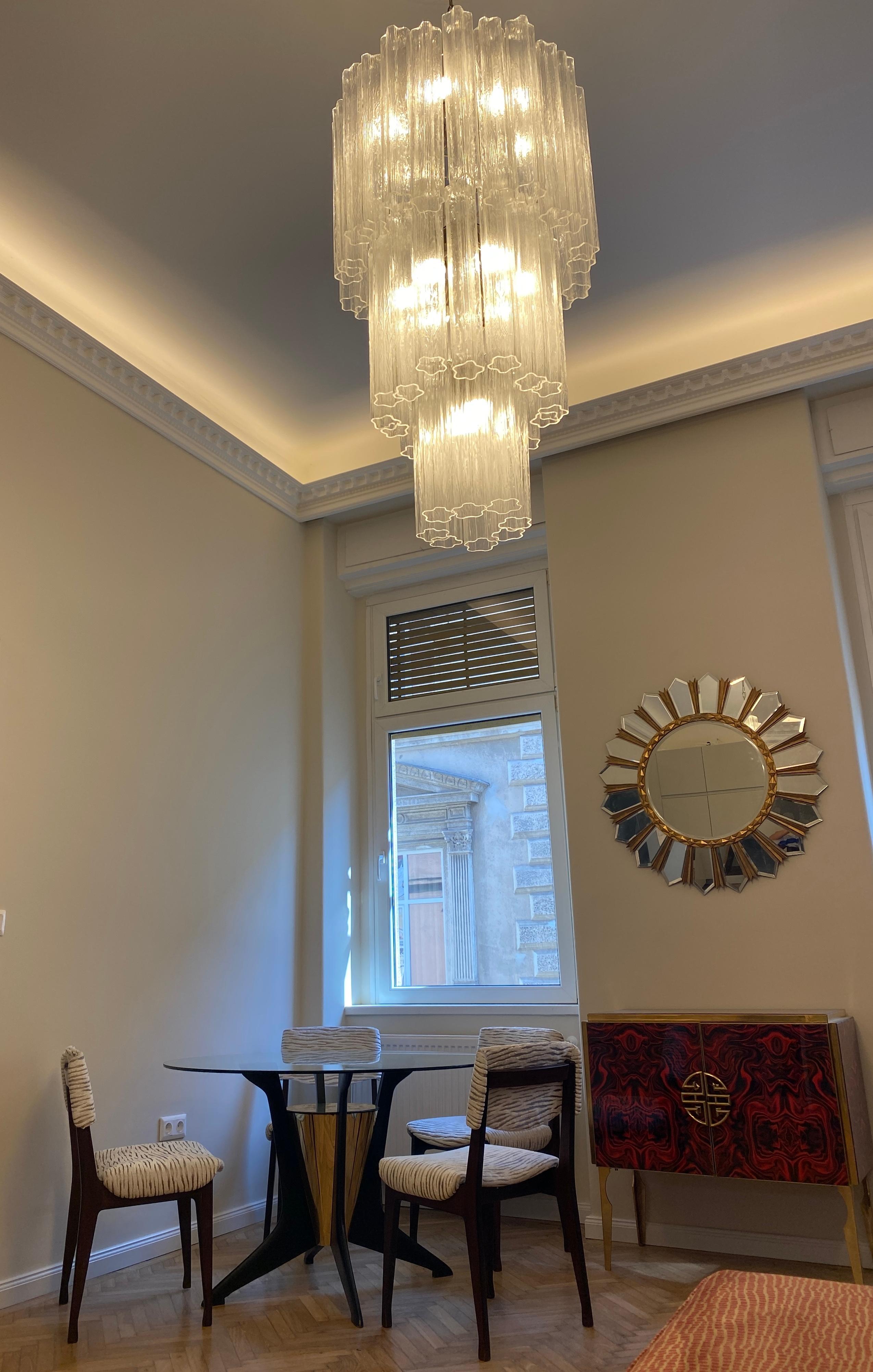 Amazing Chandelier with precious 48 tronchi Murano glass 40 cm long.
Measures: Diameter 60 cm, height 110 cm. 16 lights.
 Available also a pair and a pair of sconces.
Cleaned and re-wired, in full working order and ready to use. In excellent vintage