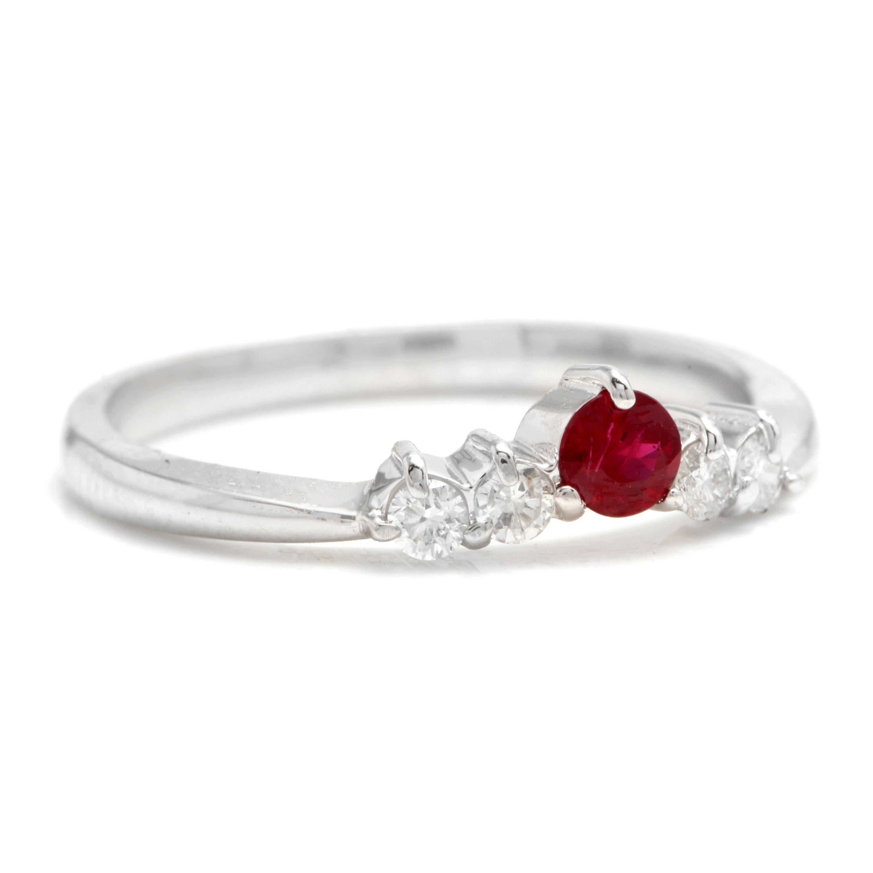 Impressive Natural Untreated Ruby and Natural Diamond 14K White Gold Ring

Suggested Replacement Value: Approx. $1,200.00

Total Natural Red Ruby Measures: Approx. 3.30mm

Ruby Treatment: Untreated 

Total Ruby Weight is: Approx. 0.15ct

Natural