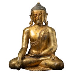 Impressive old bronze Nepali Buddha statue in Bhumisparsha Mudra Impressive old bronze Nepali Buddha statue in Bhumisparsha Mudra