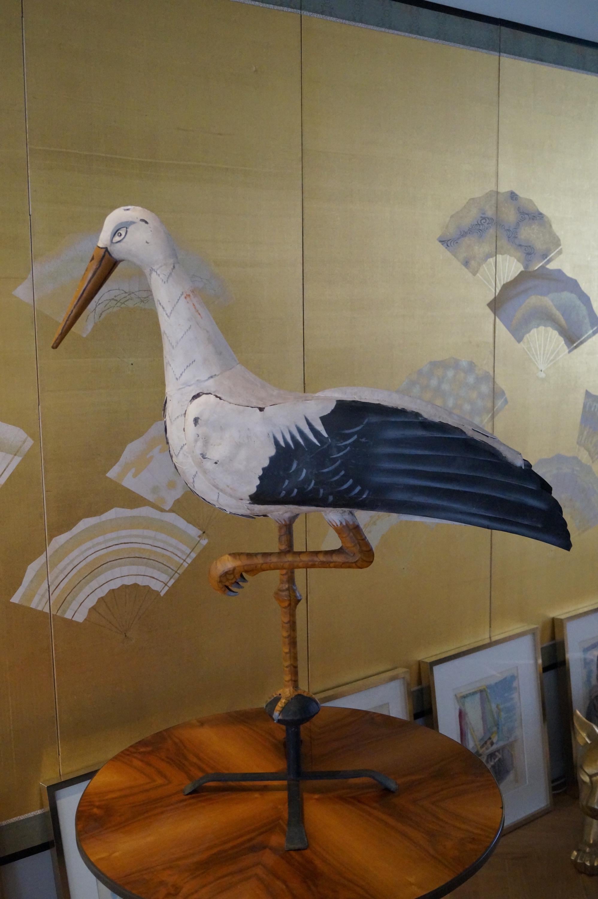 Impressive one meter high decorative stork bird weather vane
France 1900-1920.  Alsace area.

Wonderful big and rare decorative object.

Hand panned light metal. Can still be used as a weather vane but more likely as a beautiful decorative