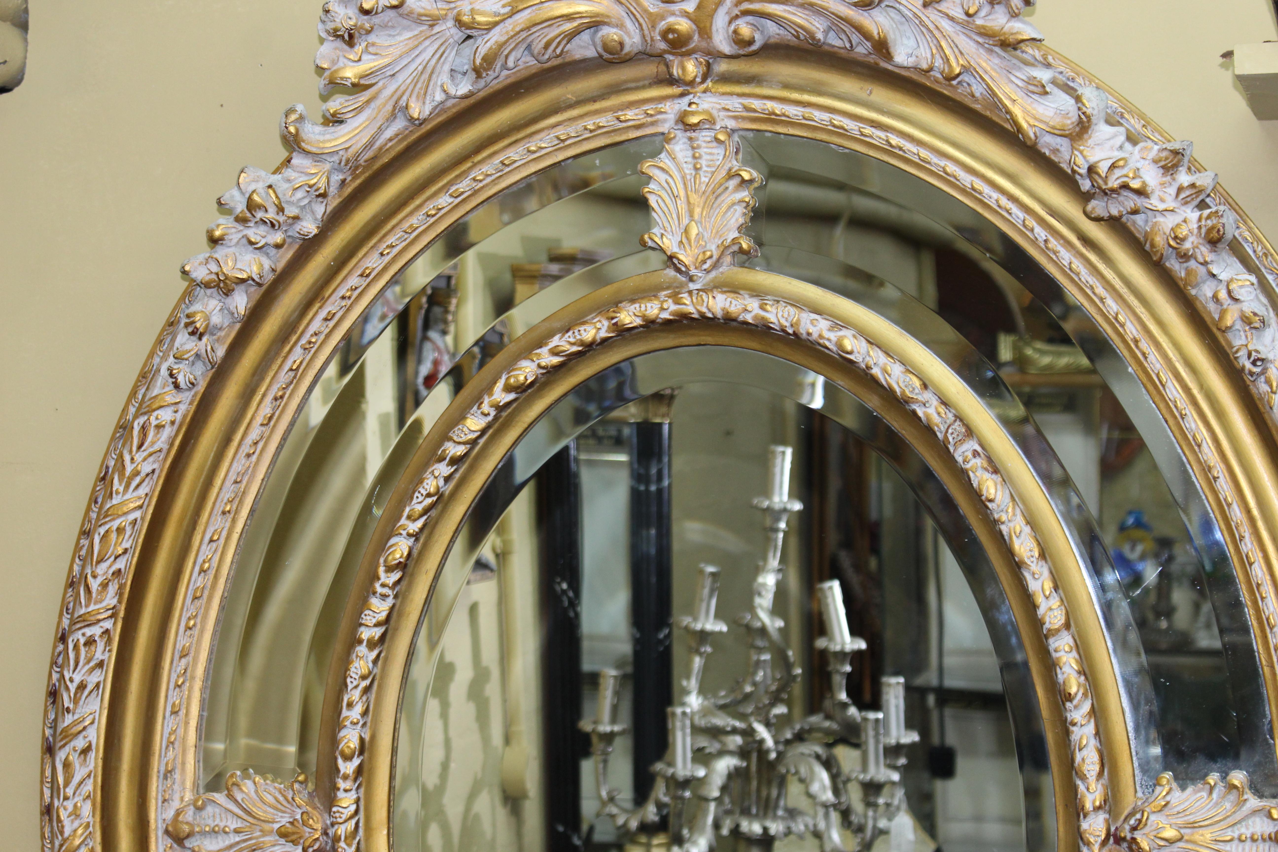 20th Century Impressive Oval Carved Gilt Limed Oak Mirror