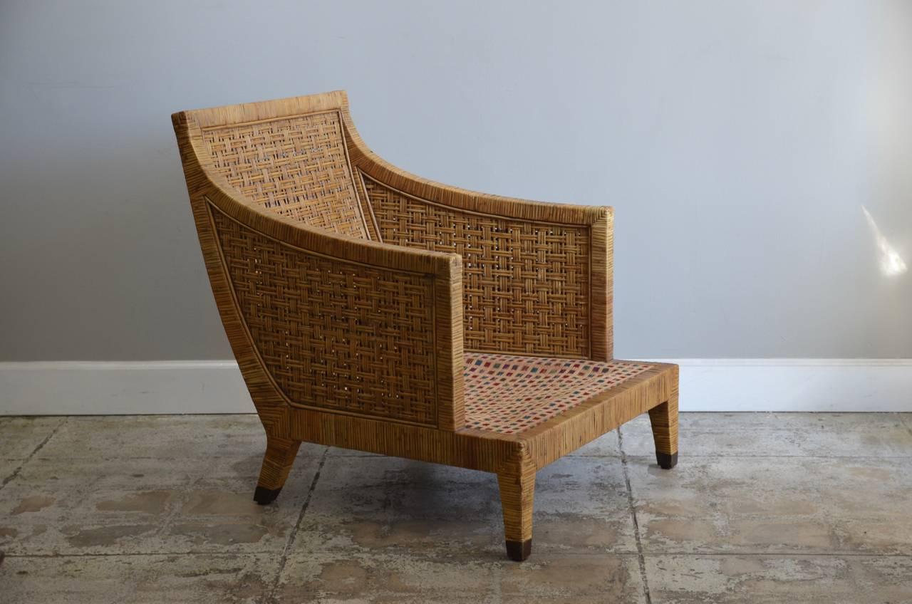 Beautiful pair of caned lounge chairs by McGuire. Rare design.

Arm height 24