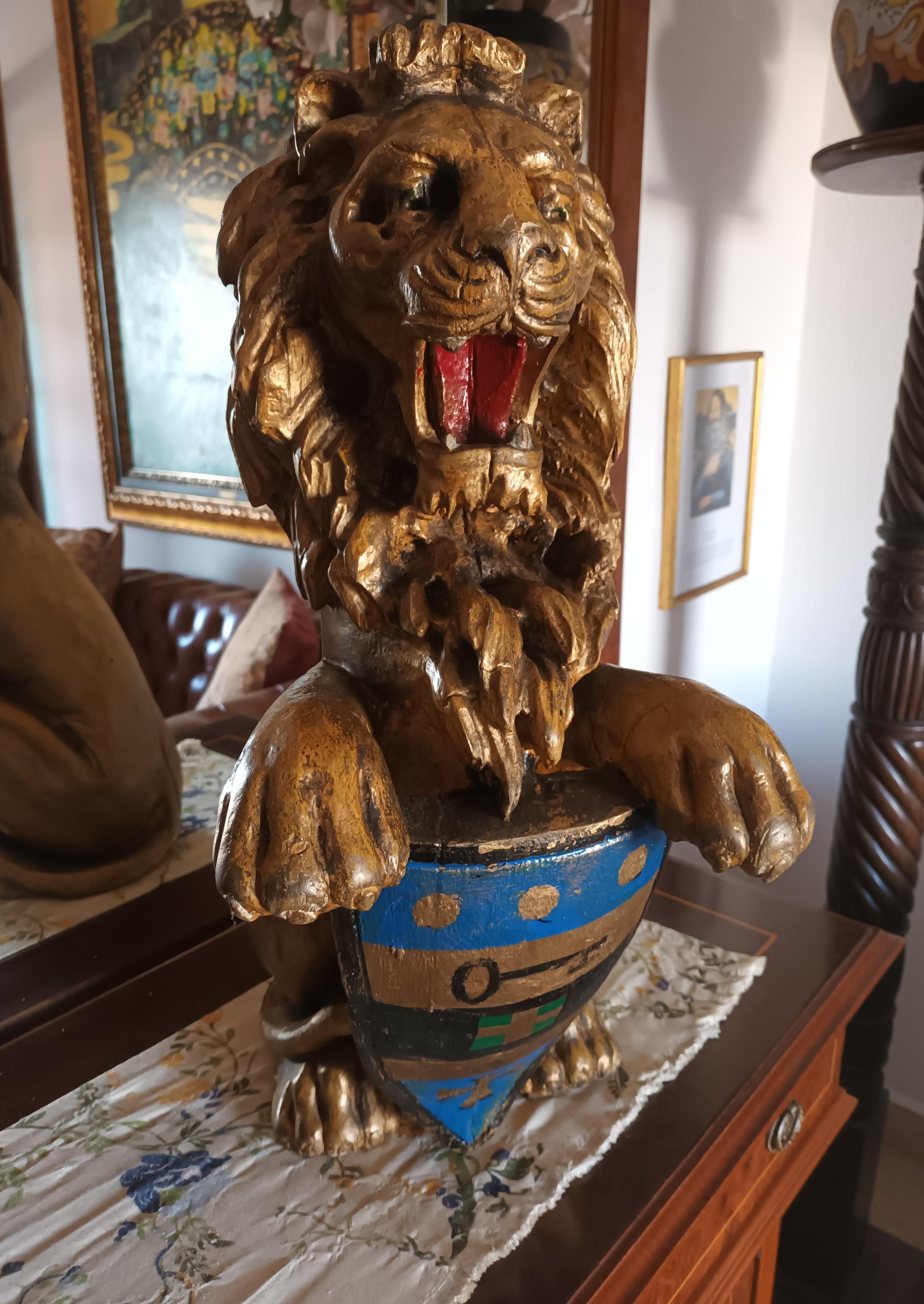 Baroque Impressive Pair of Carved Giltwood 18th C. Armorial Lions Rampant Bearing Shield For Sale
