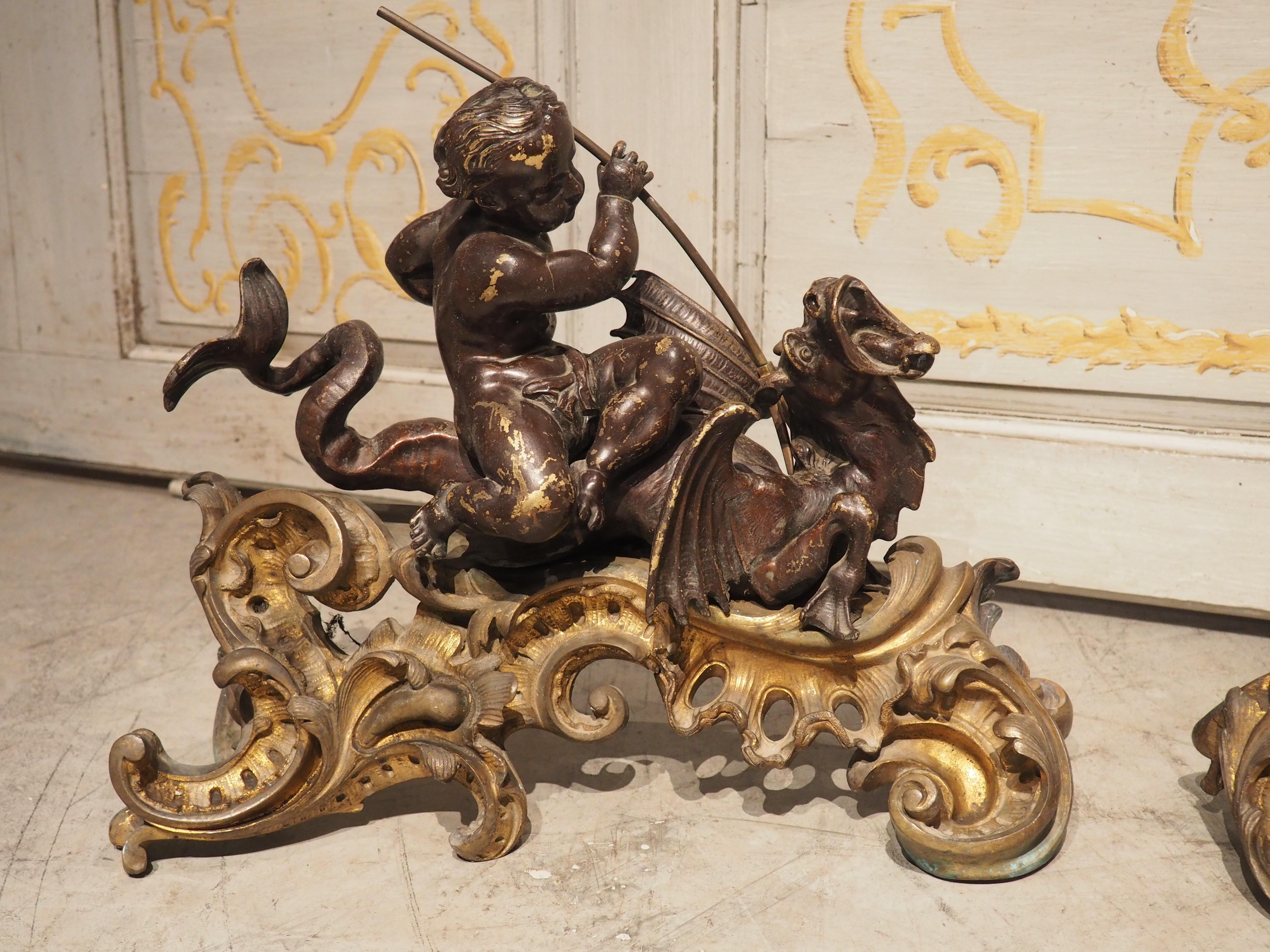Louis XV Impressive Pair of circa 1850 French Bronze Chenets with Putti and Dragons For Sale