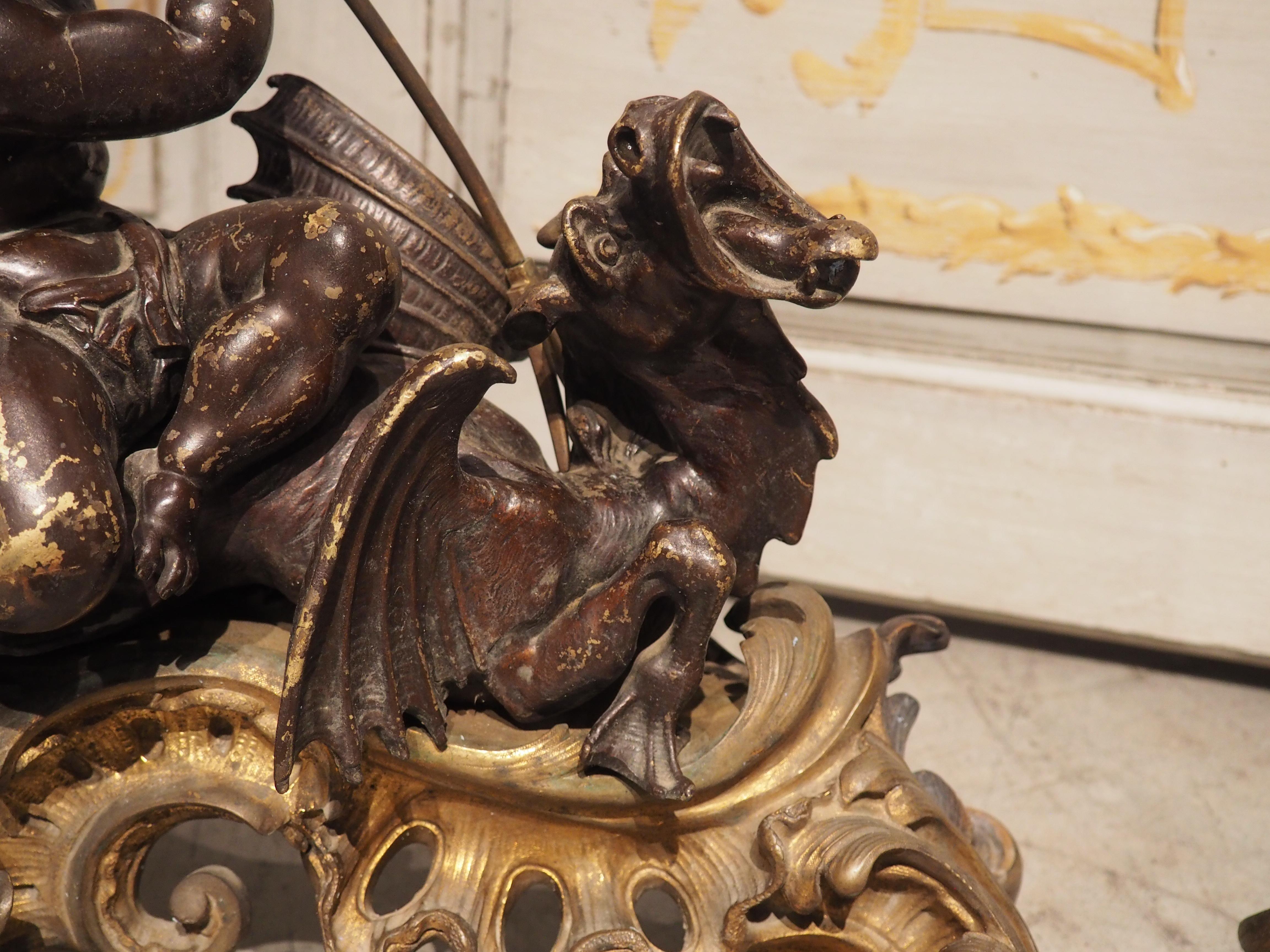 Bronze Impressionnante paire de Chenets en bronze français vers 1850 avec Putti et Dragons en vente