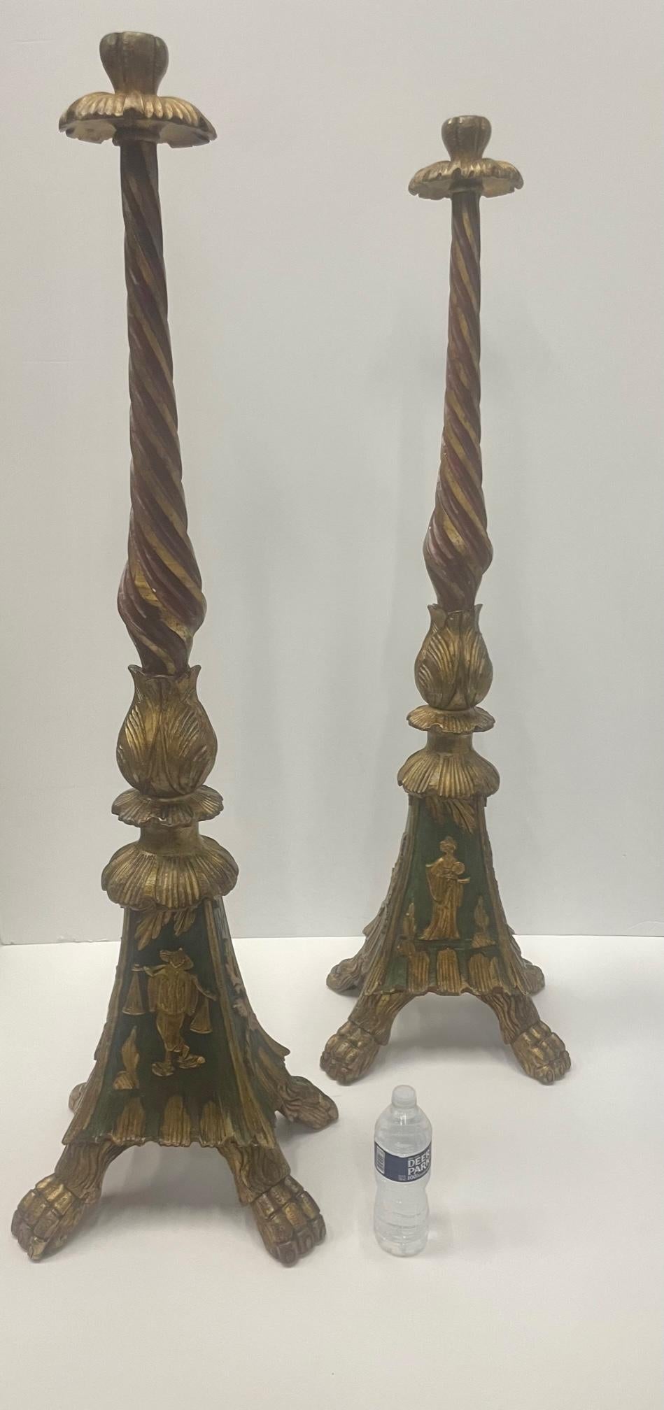 Mid-20th Century Impressive Pair of Monumental Carved Wood Italian Candlesticks with Gilt Paint For Sale