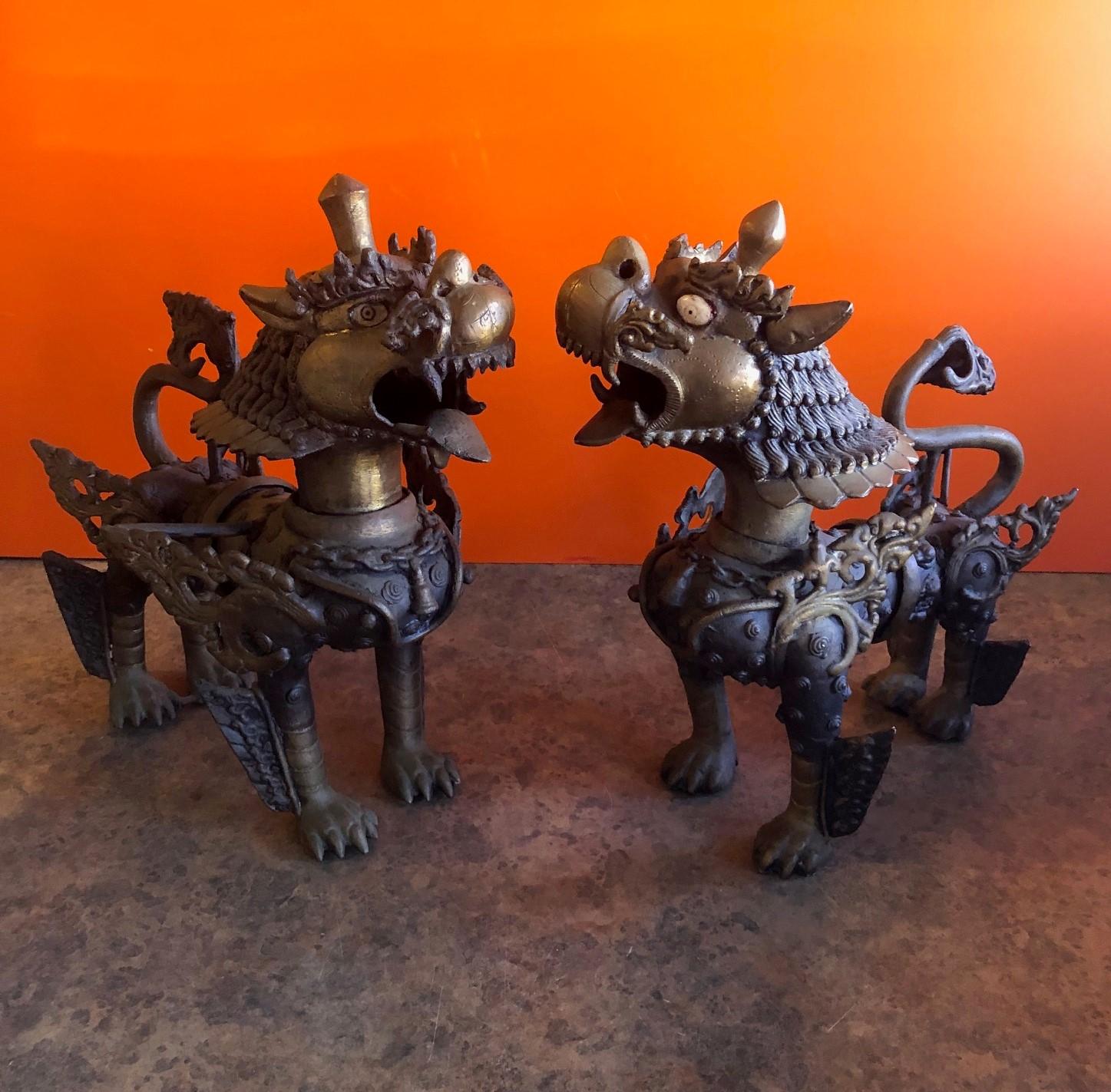 Impressive Pair of Patinated Bronze Chinese Foo Dogs or Tibetan Snow Lions In Good Condition In San Diego, CA