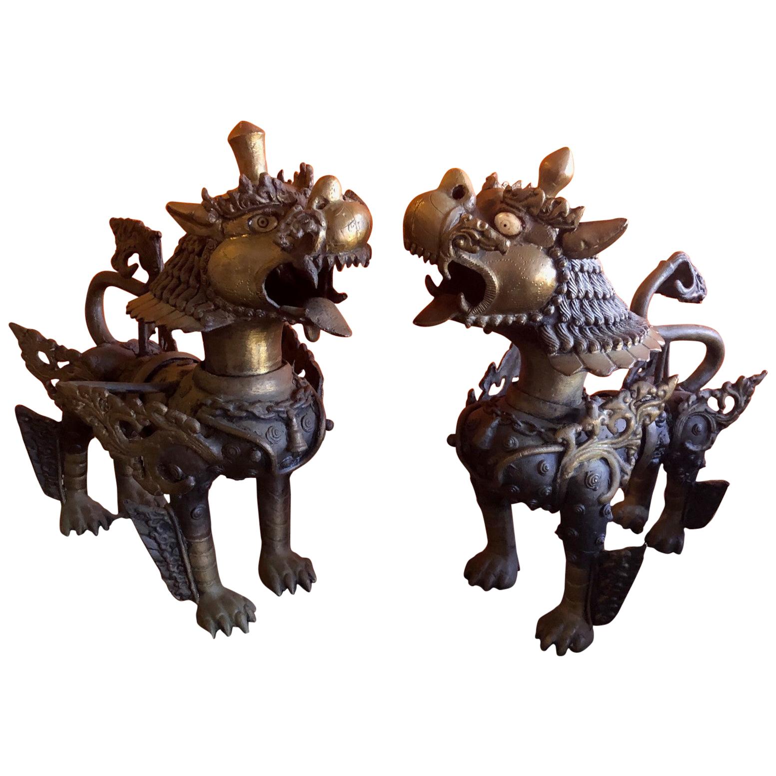 Impressive Pair of Patinated Bronze Chinese Foo Dogs or Tibetan Snow Lions