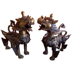 Antique Impressive Pair of Patinated Bronze Chinese Foo Dogs or Tibetan Snow Lions