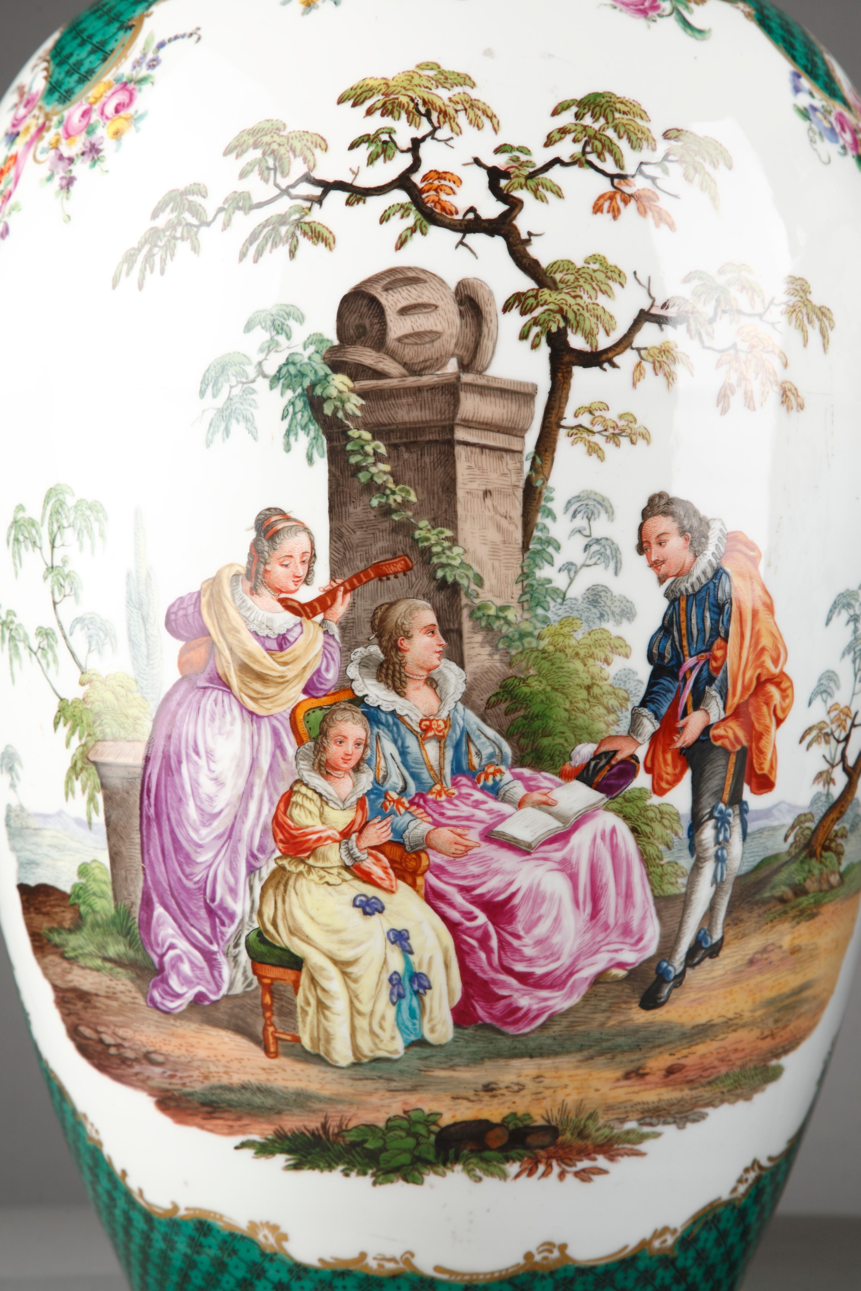 Bearing the mark AR interlaced 

A pair of large Chinese style white porcelain baluster shaped vases and covers attributed to Samson & Cie. Each finely painted with polychrome 18th century style gallant scenes and flower garlands. The neck decorated