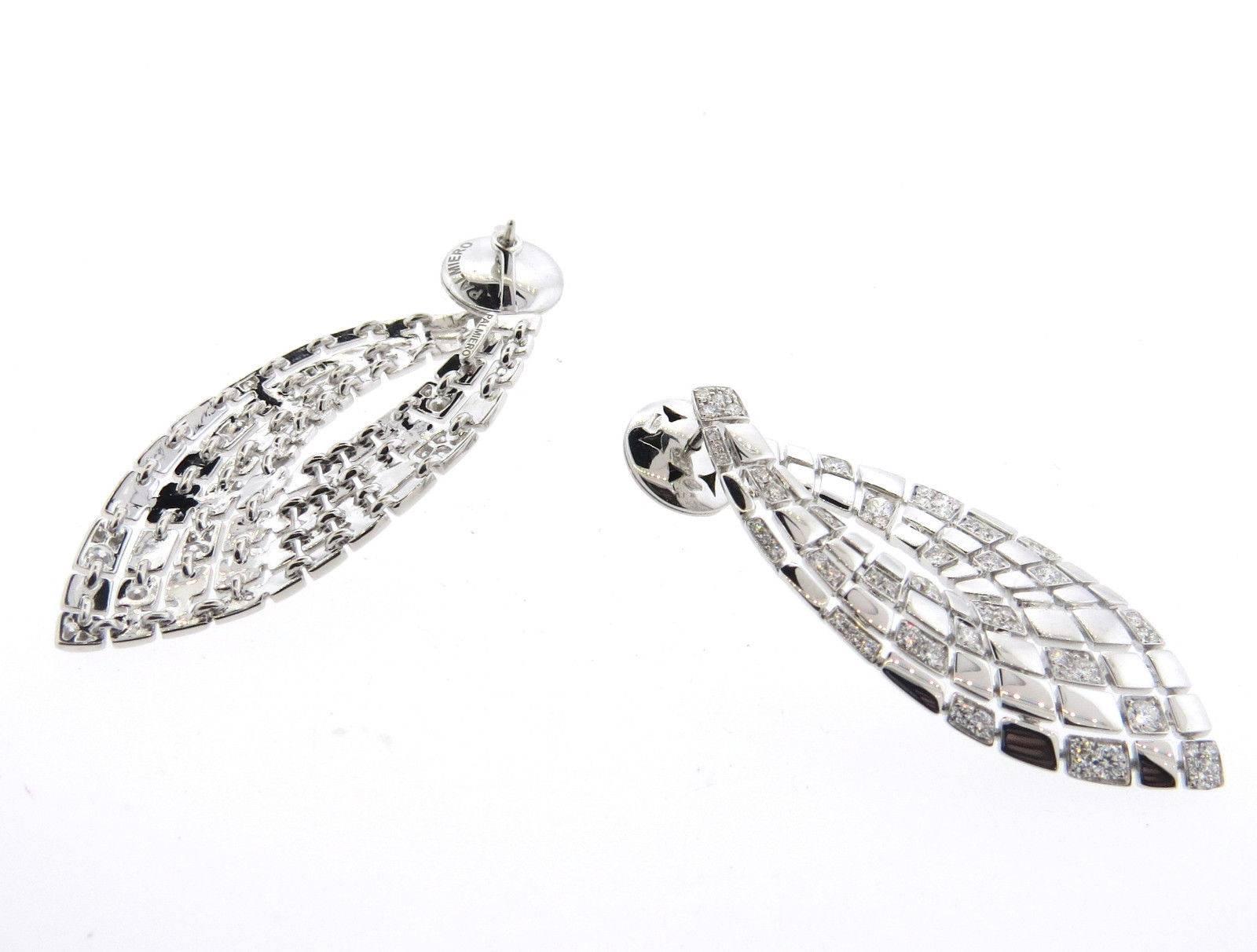 A pair of 18k white gold earrings set with approximately 2.24ctw of F/VS1 diamonds.  Crafted by Palmiero, the earrings measure 50mm x 23mm and weigh 21.4 grams. Marked: Palmiero, 750.  The earrings currently retail for $16,540.