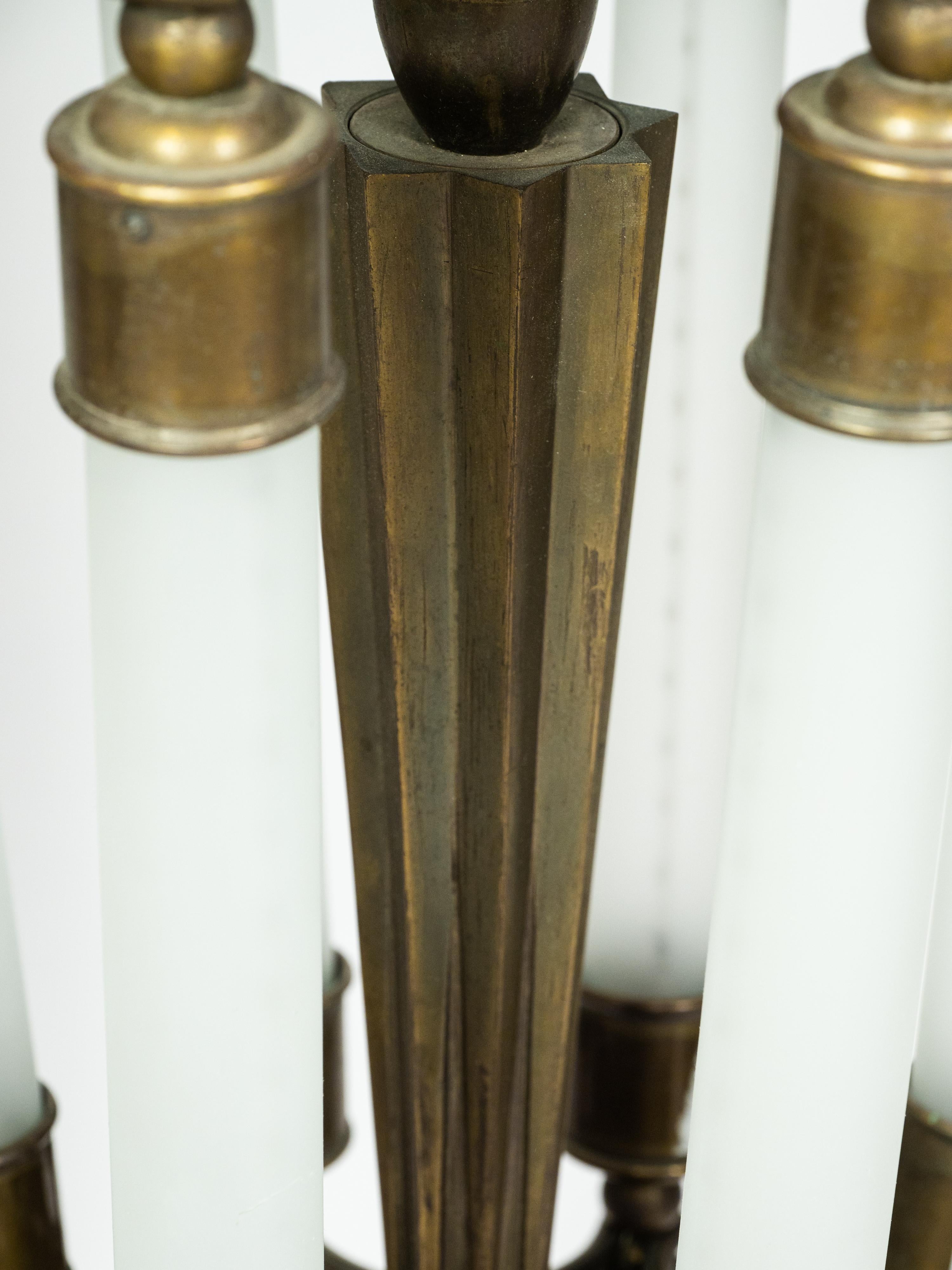 Cast Impressive pendat light in cast bronze designed by Ottavio Cabiati For Sale