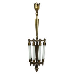 Impressive pendat light in cast bronze designed by Ottavio Cabiati