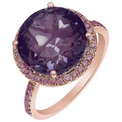 Impressionnante bague en or rose avec saphir rose et améthyste