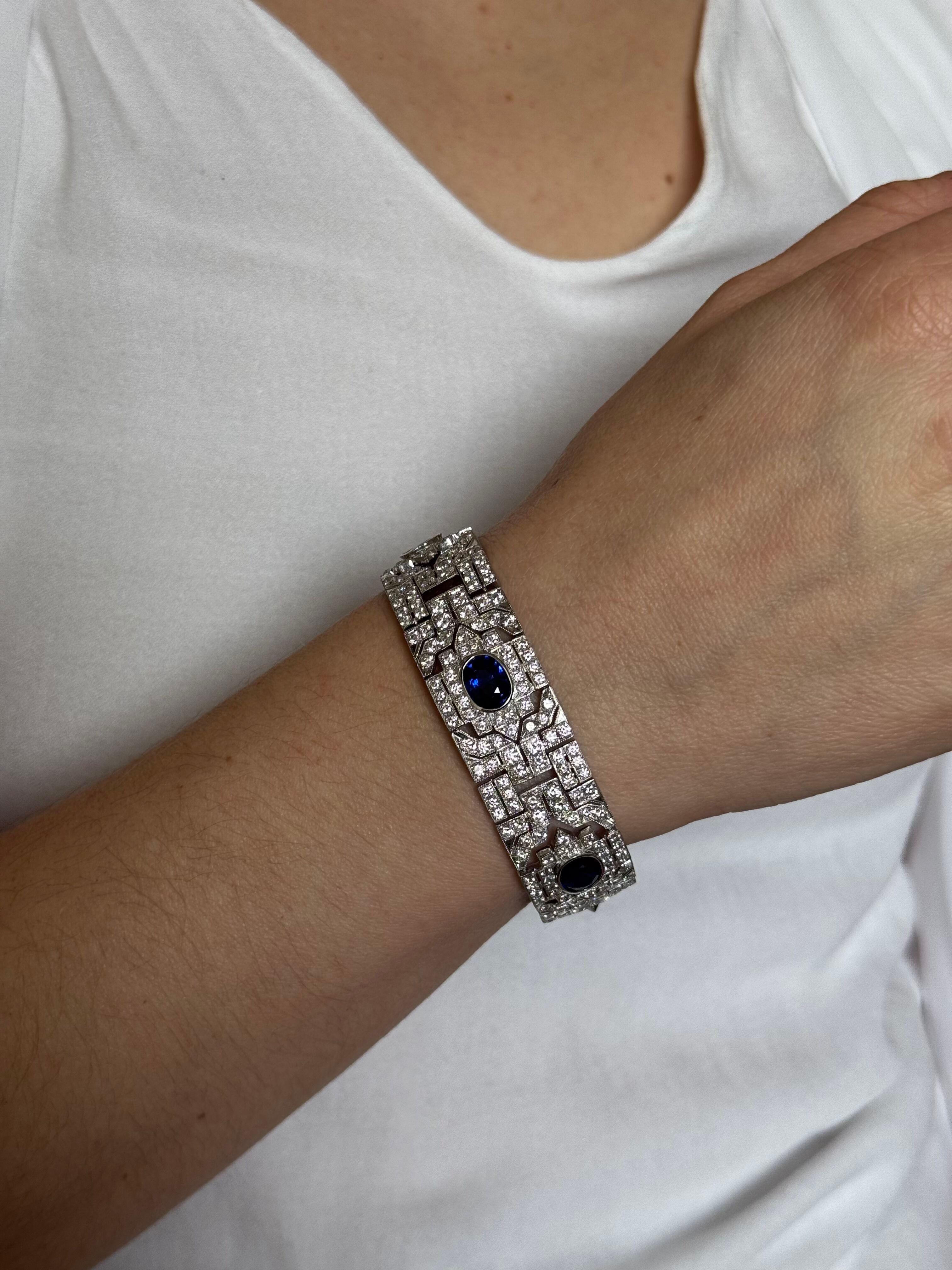 Impressive platinum bracelet, featuring six oval Ceylon sapphires - each approx. 2ct, total 12 carats. Surrounded with diamonds  - total approx. 10 carats H-I/SI1. 
Bracelet is 6.75