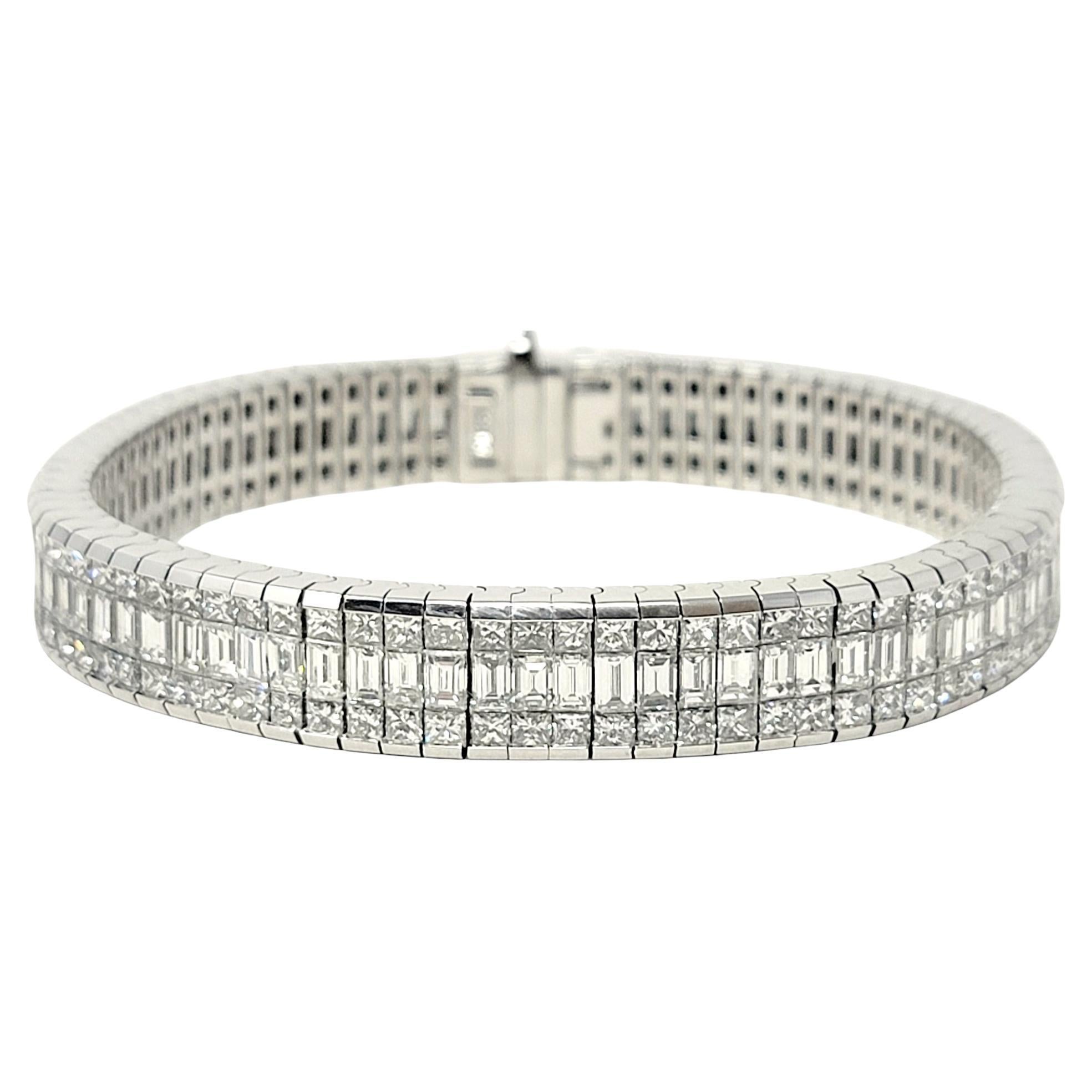 This striking bracelet is filled from edge to edge with icy white natural diamonds, creating an absolutely  stunning amount of sparkle on the wrist. Multiple rows of princess and baguette cut diamonds are invisible set throughout, creating a