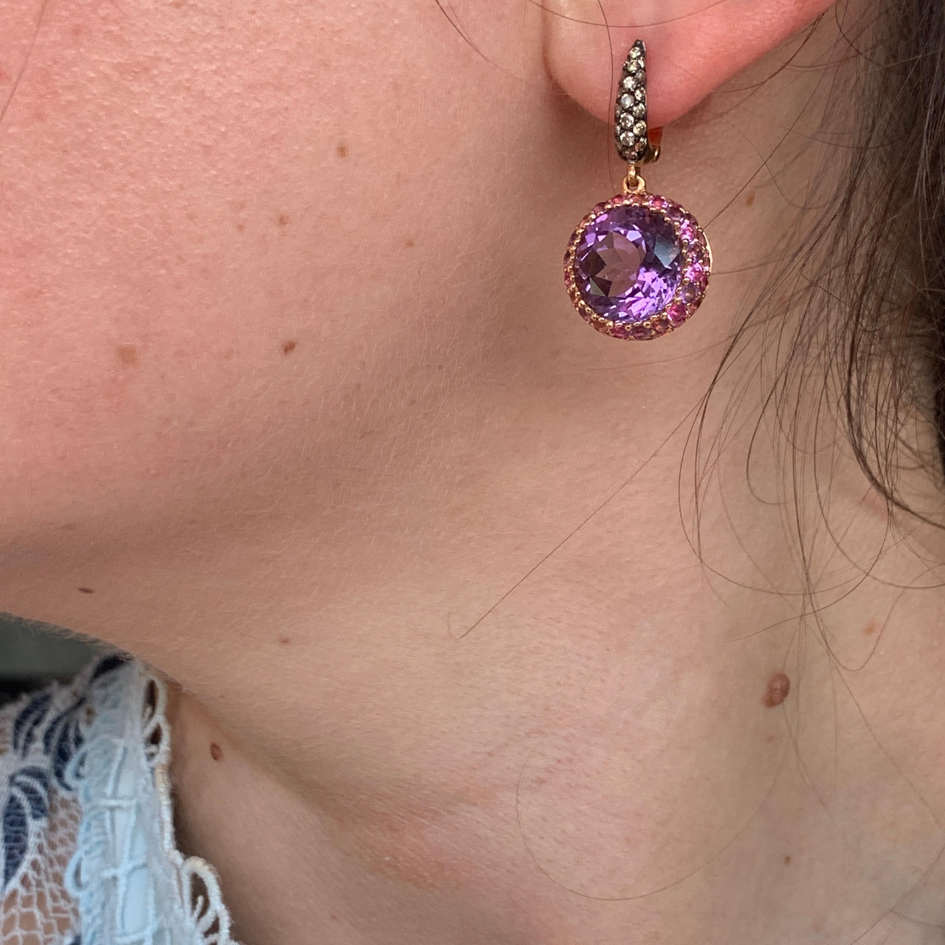 Earrings Yellow Gold 18 K (Matching Ring Available)

Diamond 38RND -0,41ct
Amethyst 26-9,79ct
Pink Sapphire 30-1,23ct
Tourmaline 24-0,67ct

Weight 8.31 grams

With a heritage of ancient fine Swiss jewelry traditions, NATKINA is a Geneva based