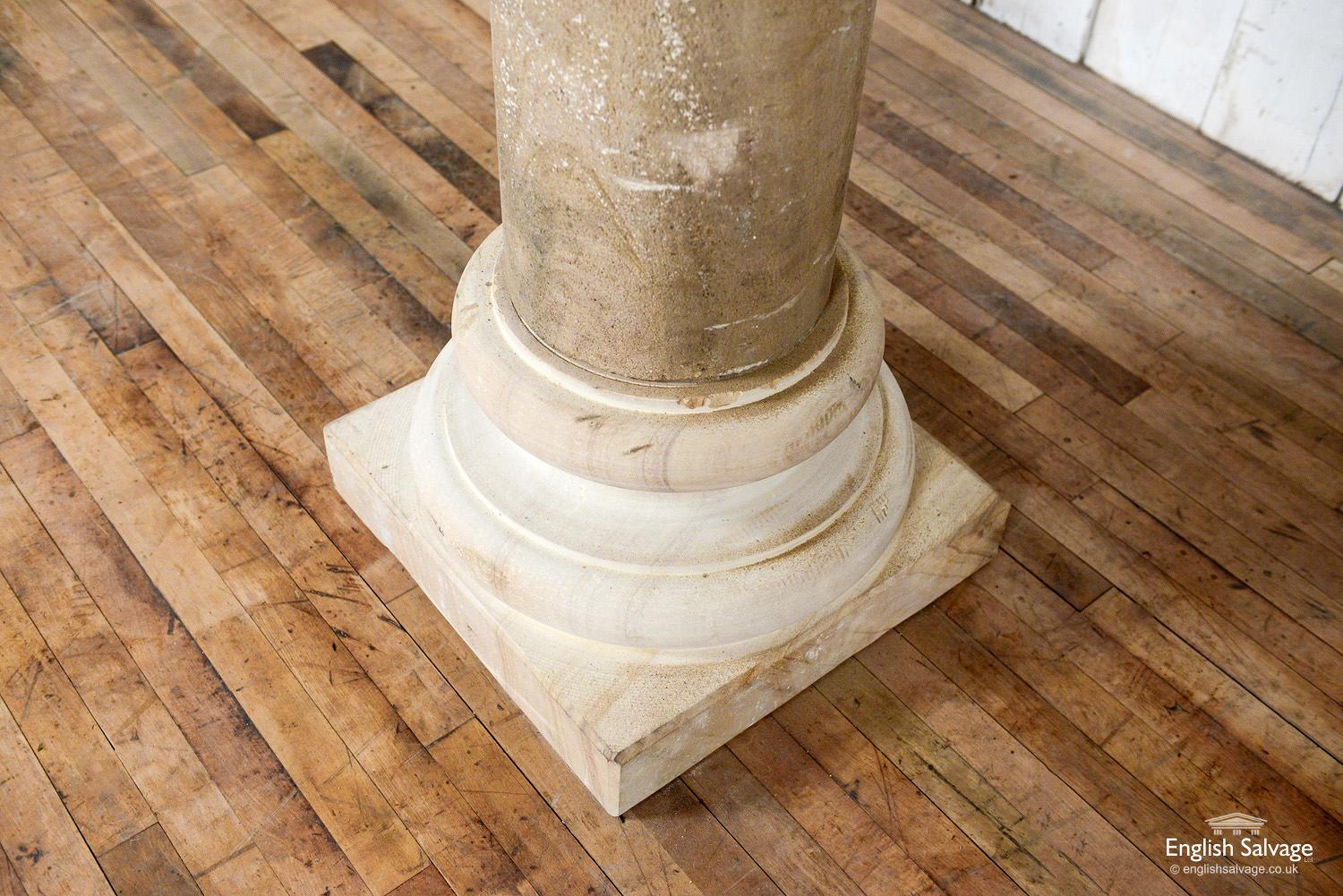 Impressive pair of sandstone pillars in three parts consisting of bases, columns and capitols. The stone has beautiful natural markings and variations, and the columns are slightly darker than the bases and capitols. Overall dimensions are given