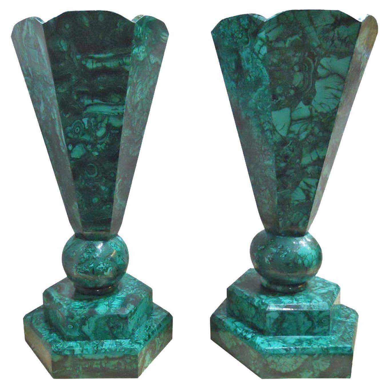 A striking set of six malachite vases from the Congo, crafted in the 1960s. These vases showcase the captivating, natural beauty of malachite, with rich, vibrant green hues and intricate patterns that make each piece unique. Perfect for collectors