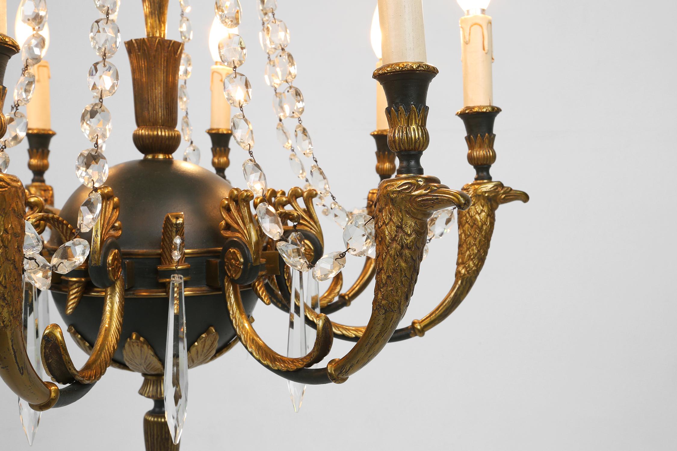 Mid-20th Century Impressive set of a large bronze Empire Chandelier with wall lights, 1950 For Sale