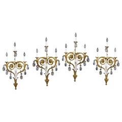 Impresionante juego de cuatro candelabros de bronce dorado y cristal de roca de finales del siglo XIX