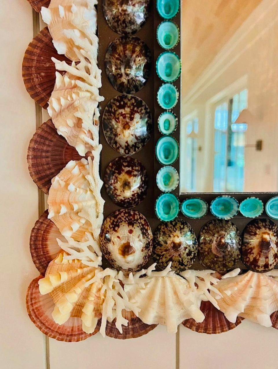 All shell work is sold by the linear foot,  when budget is finalized DN creates a custom palette and layout for approval based on this design. 
Under the sea, A kaleidoscope of colors this shell mirror shown in shades of peach, tortoise blue and