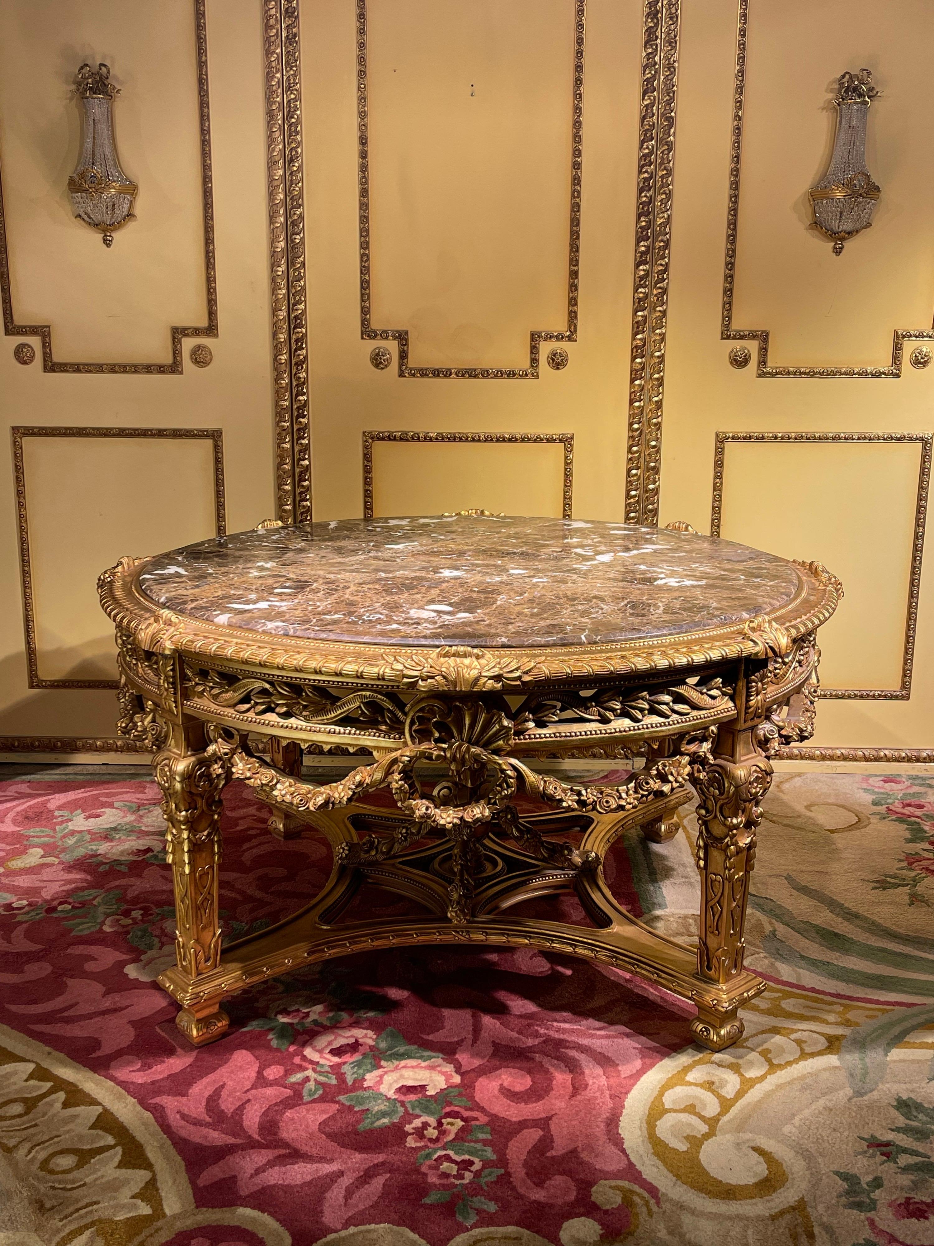 Impressive Solid Salon center table Louis XV - Beech, Gold

High quality solid beechwood finely carved down to the last detail. Gold taken. On curved, carved legs, connected with X-shaped, heavily carved gutter. Ornamented frame with garlands.