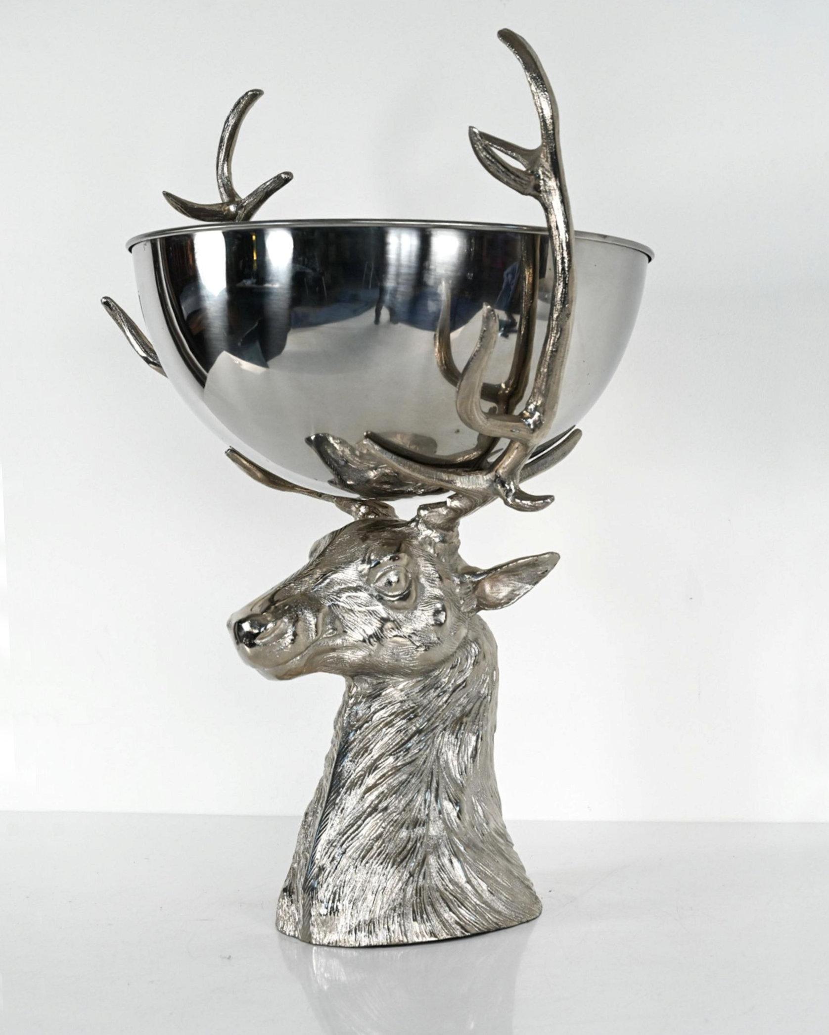 Impressive, large silverplate punch bowl with stag form base, 33 1/2 inches tall.  In very good condition.