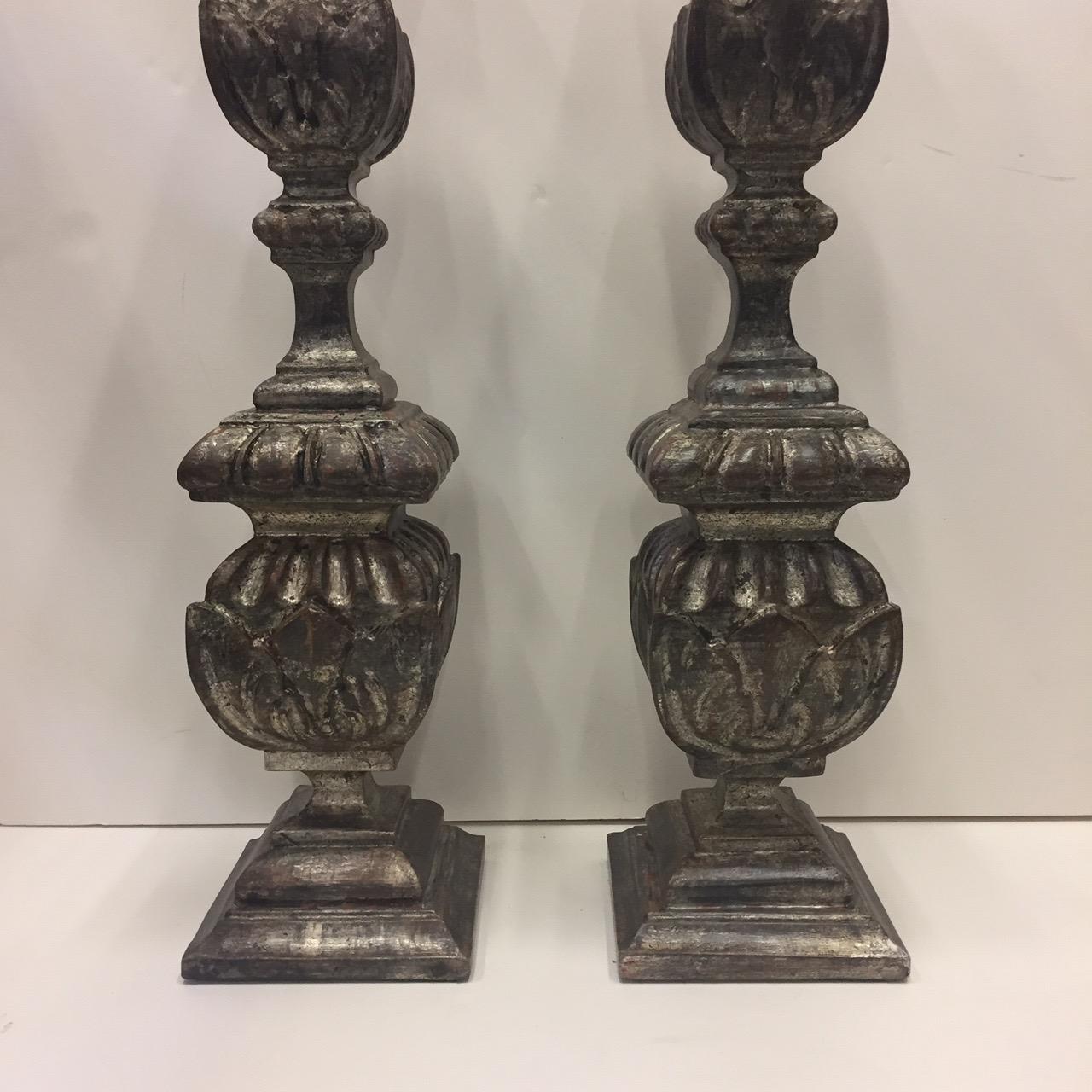 Impressive tall pair of 19th century silver leaf pricket candlestick table lamps having authentic aged patina.
No shades.