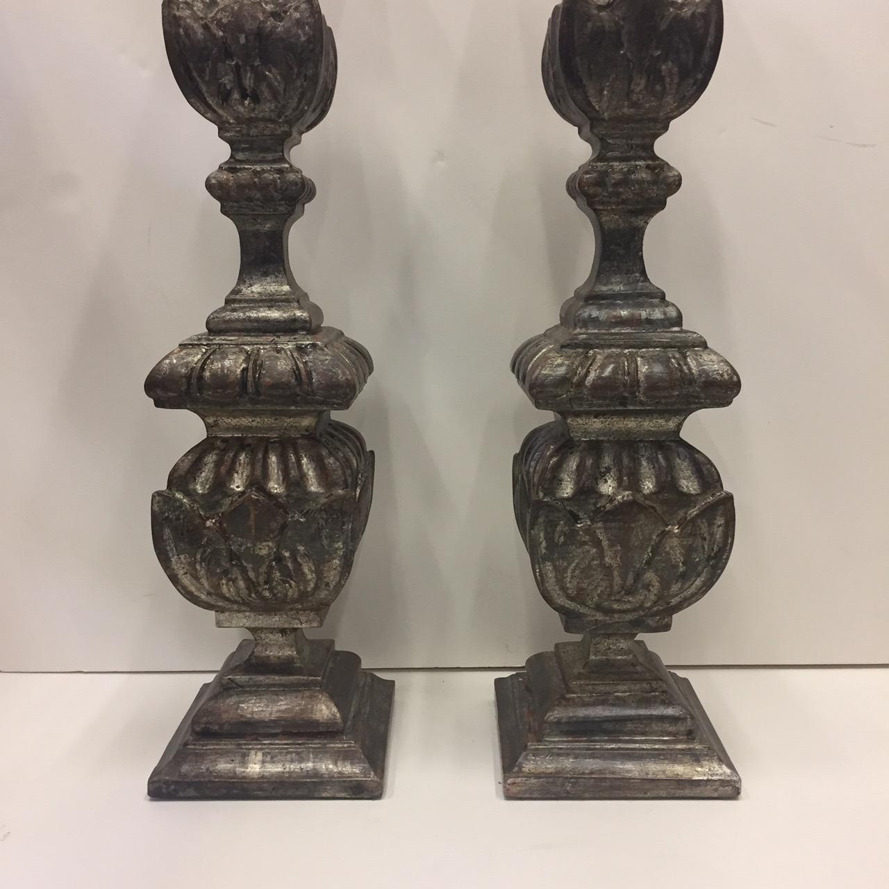 Impressive tall pair of 19th century silver leaf pricket candlestick table lamps having authentic aged patina.
No shades.