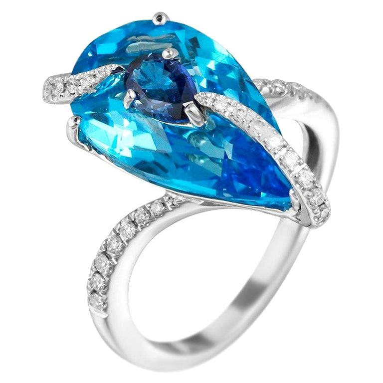 Impressionnante bague en or blanc avec topaze, saphir bleu et diamant