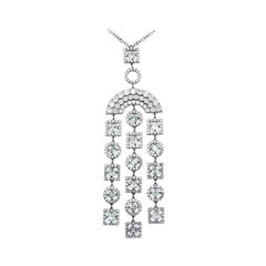 Impressionnant collier goutte en or blanc et zircon avec topaze et topaze